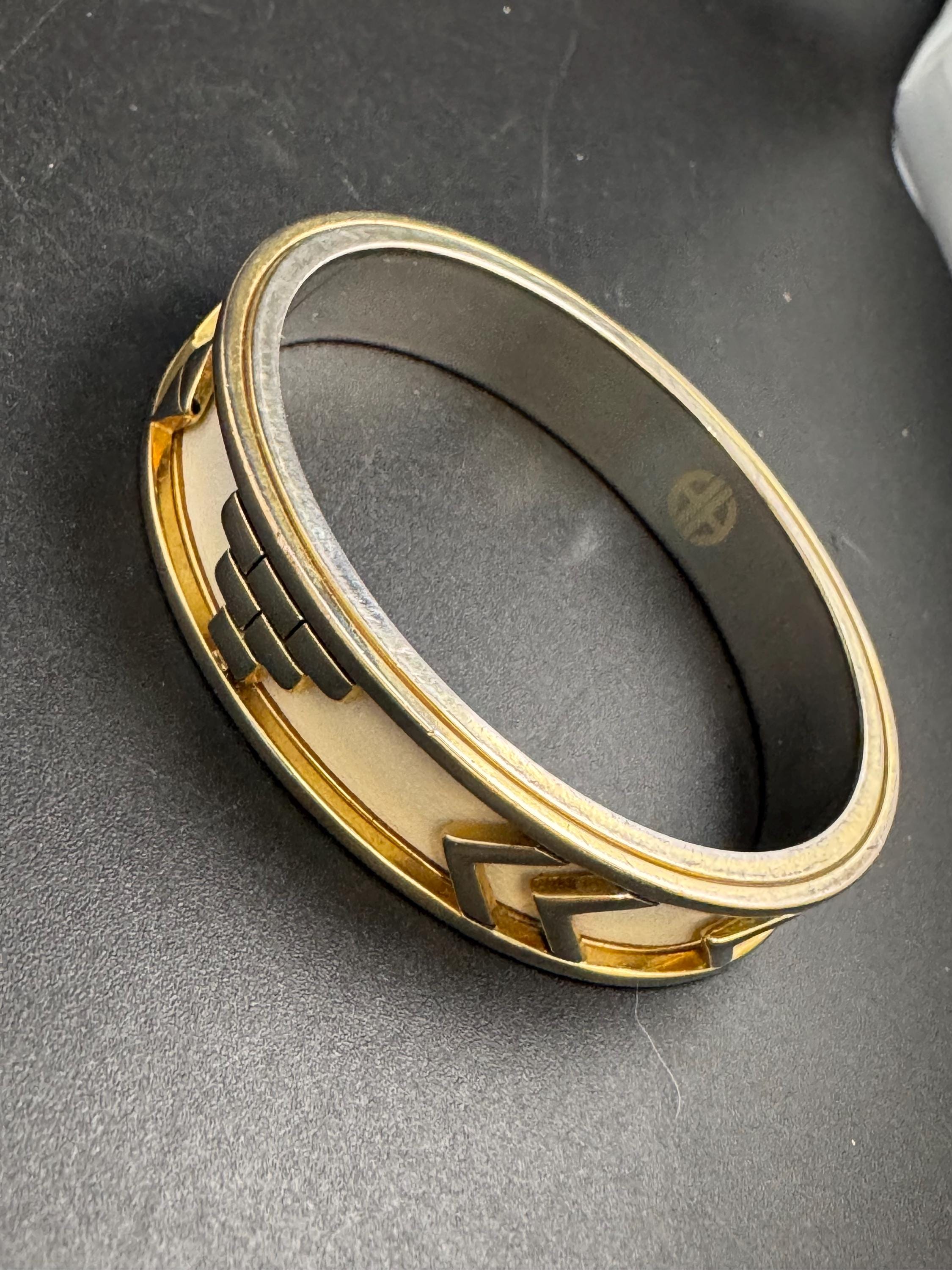 House of Harlow cream inca bangle, enamelled 1960s silver tone and gold plated