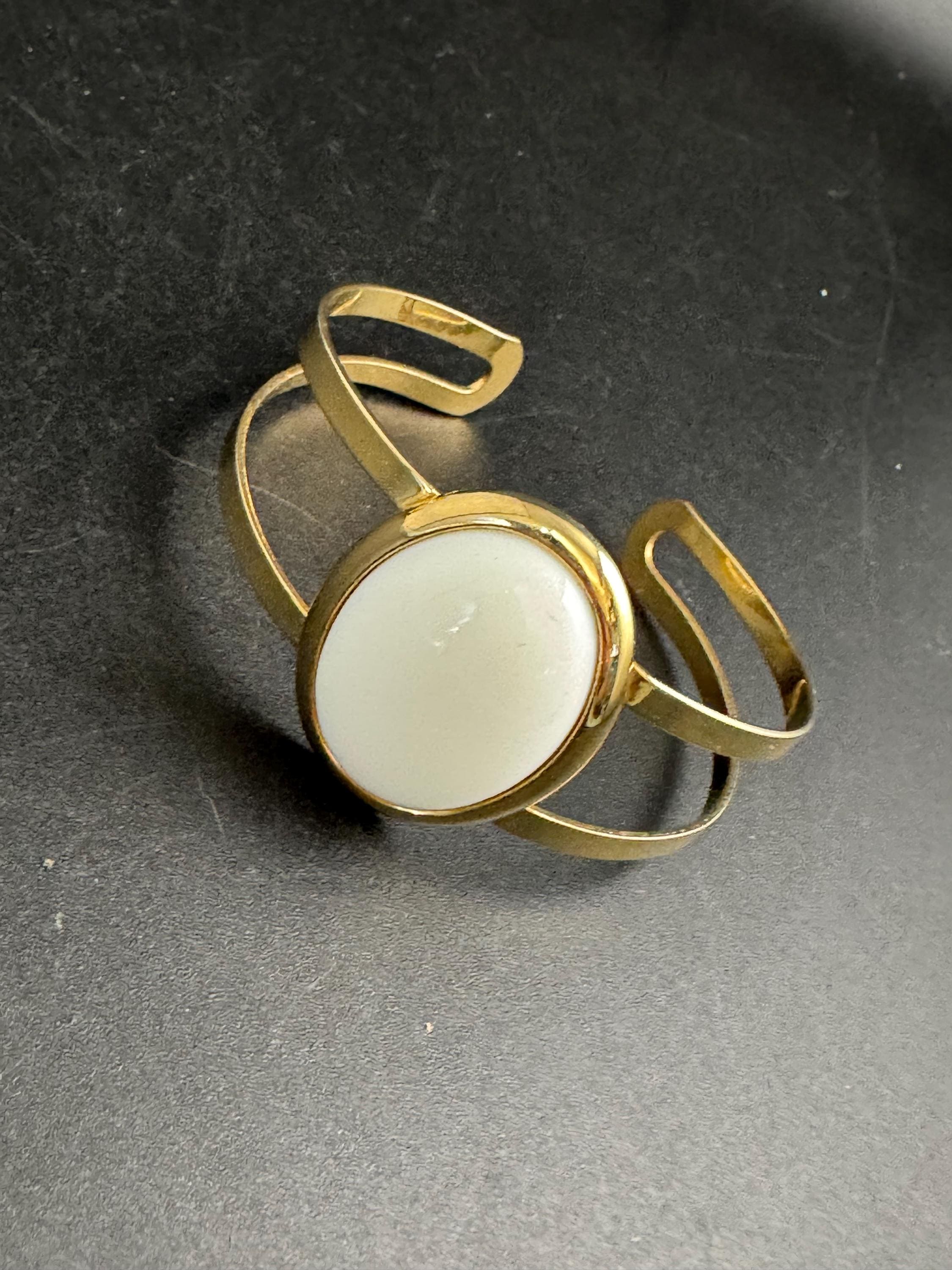 Avon white cabochon open bangle, vintage acrylic and signed