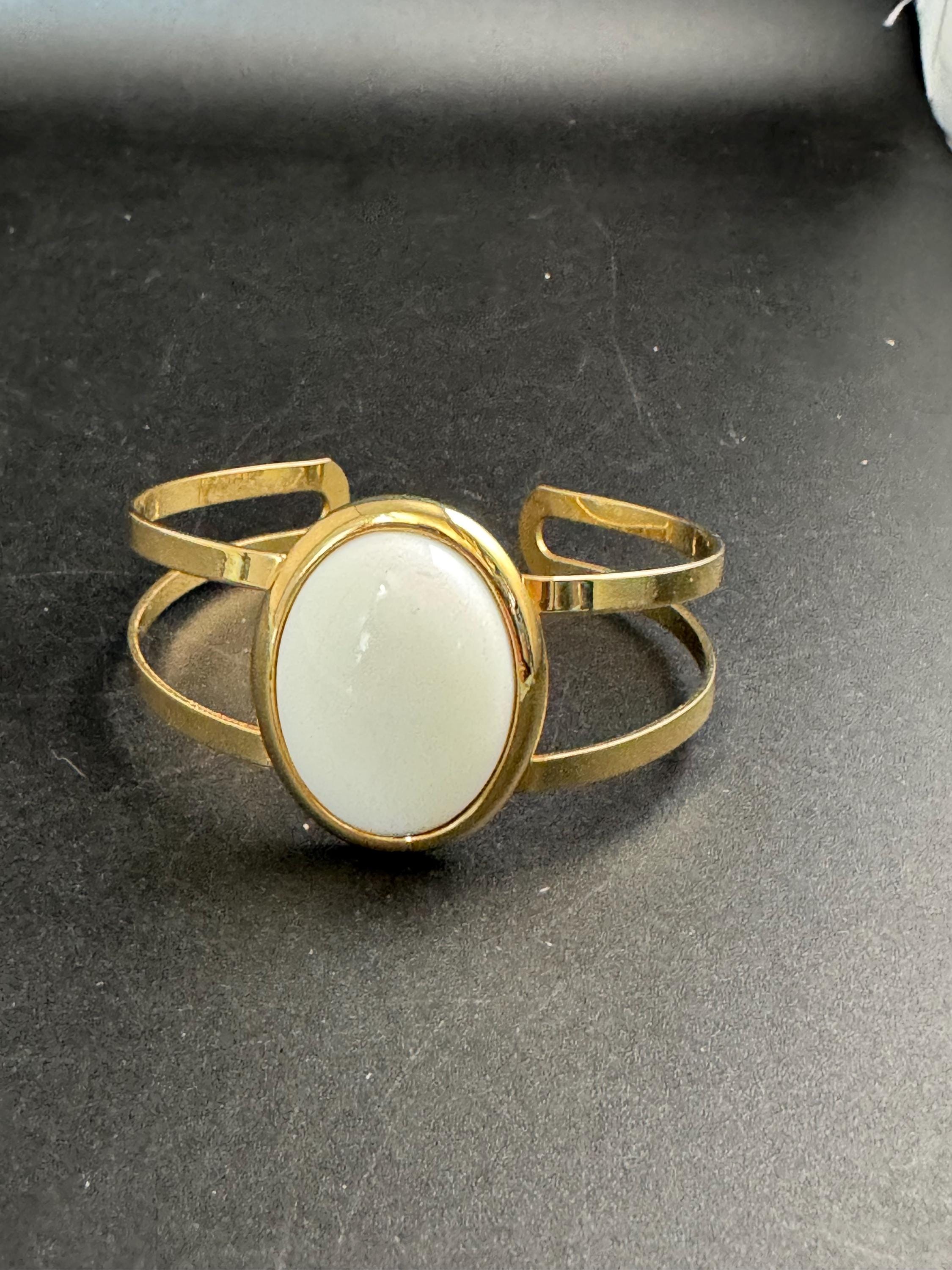 Avon white cabochon open bangle, vintage acrylic and signed