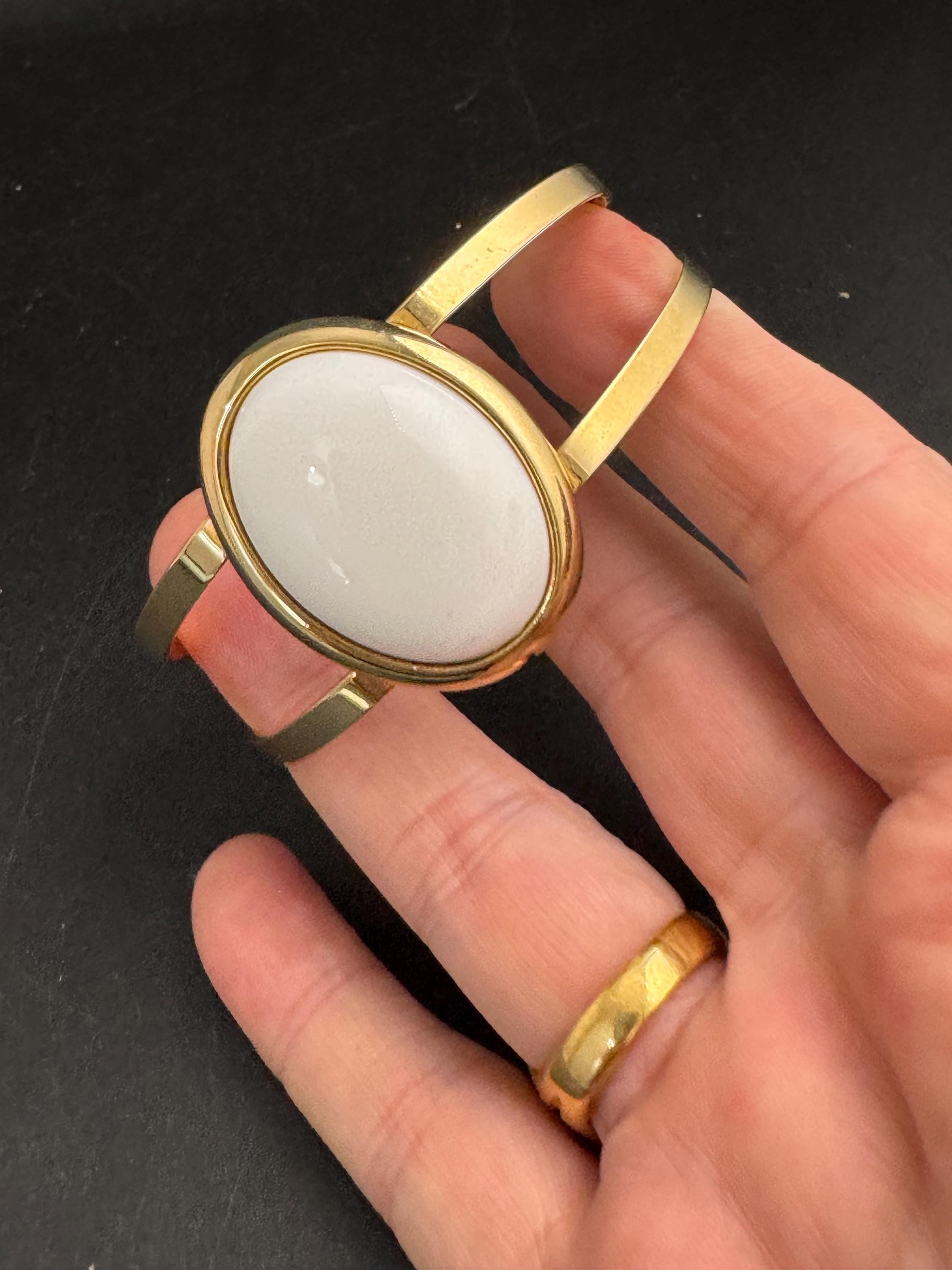Avon white cabochon open bangle, vintage acrylic and signed