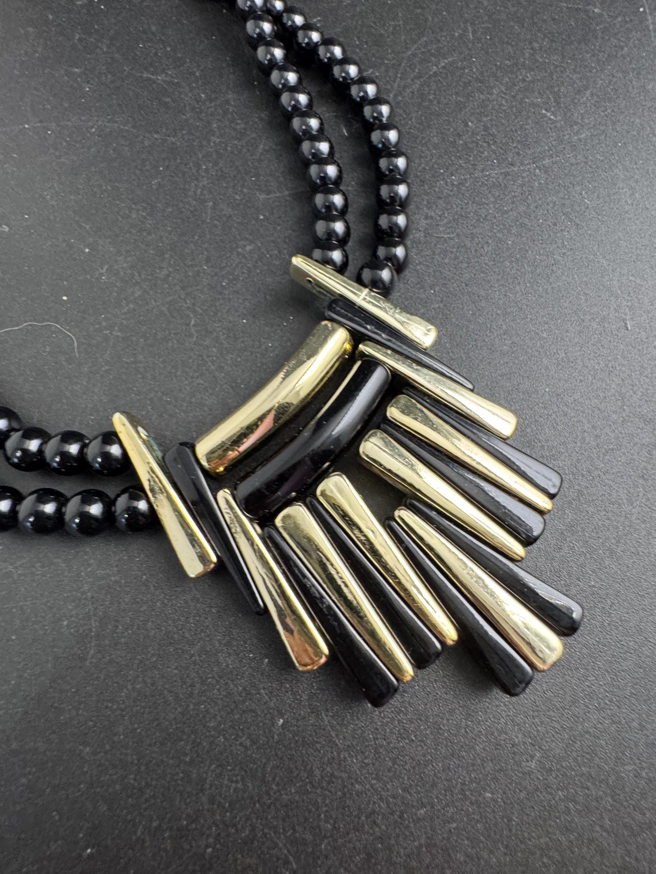 Black and gold beaded statement necklace, acrylic deco style pendant 1970s