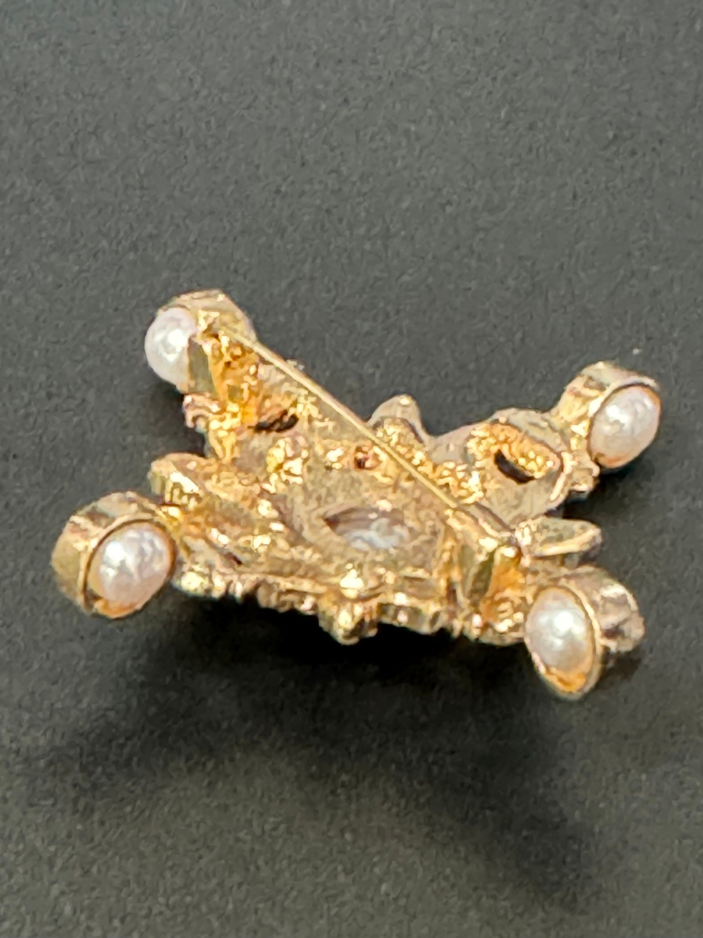 Large faux pearl and bright pink and emerald green diamanté rhinestone cross brooch