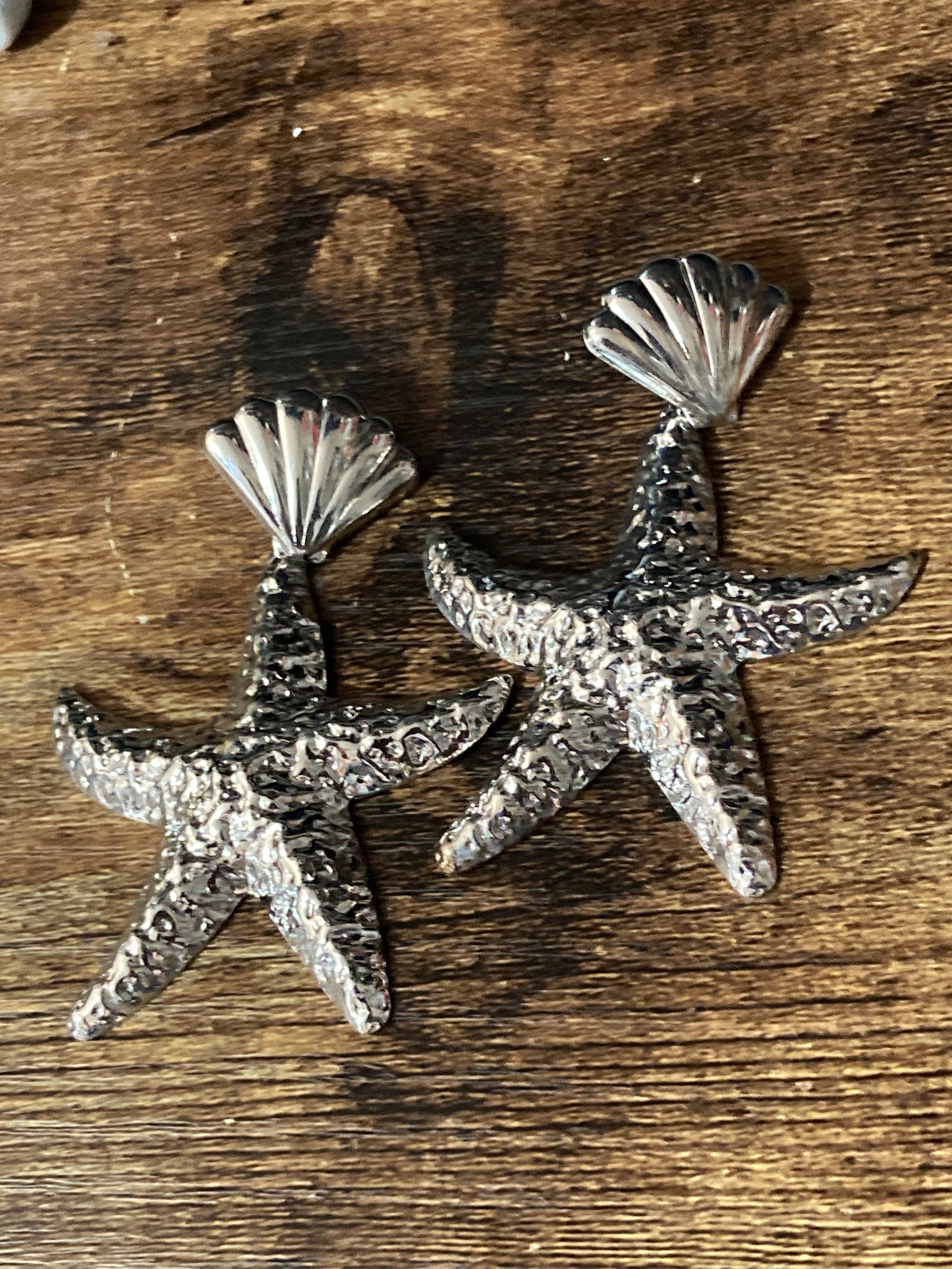 Oversized silver metal starfish earrings