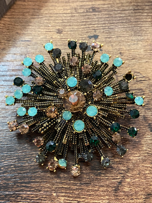 Large turquoise bronze diamanté starburst brooch