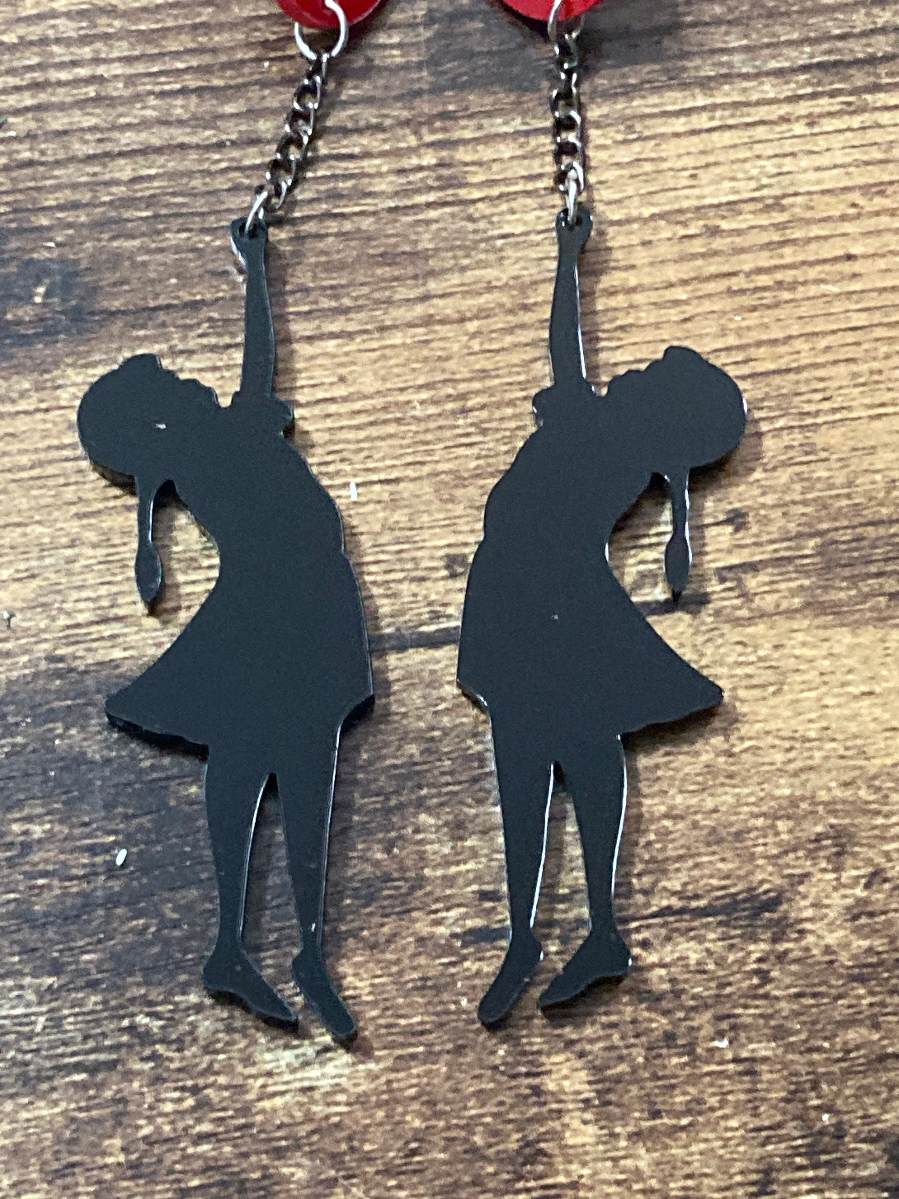 Banksy inspired girl with balloon earrings