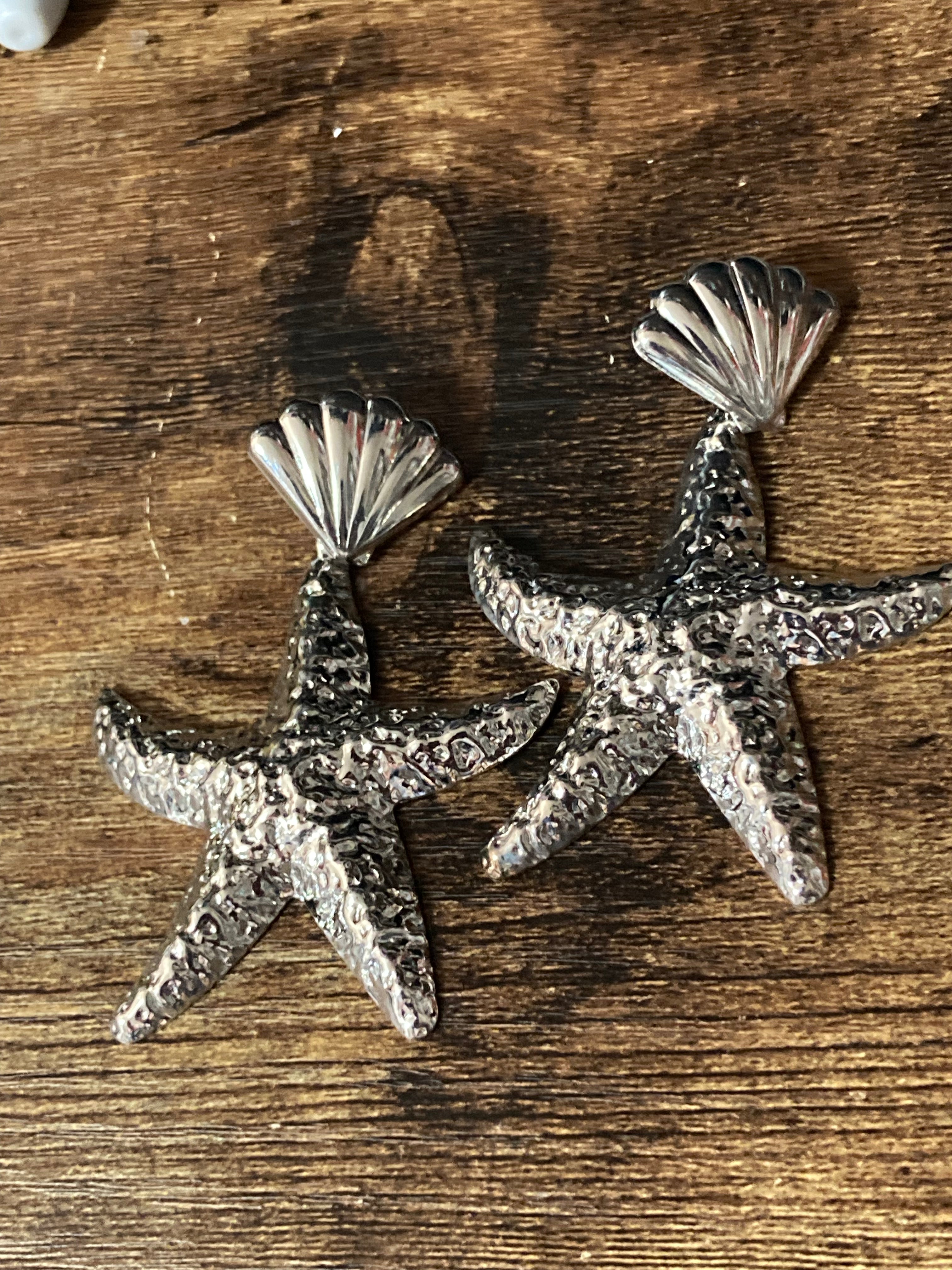 Oversized silver metal starfish earrings