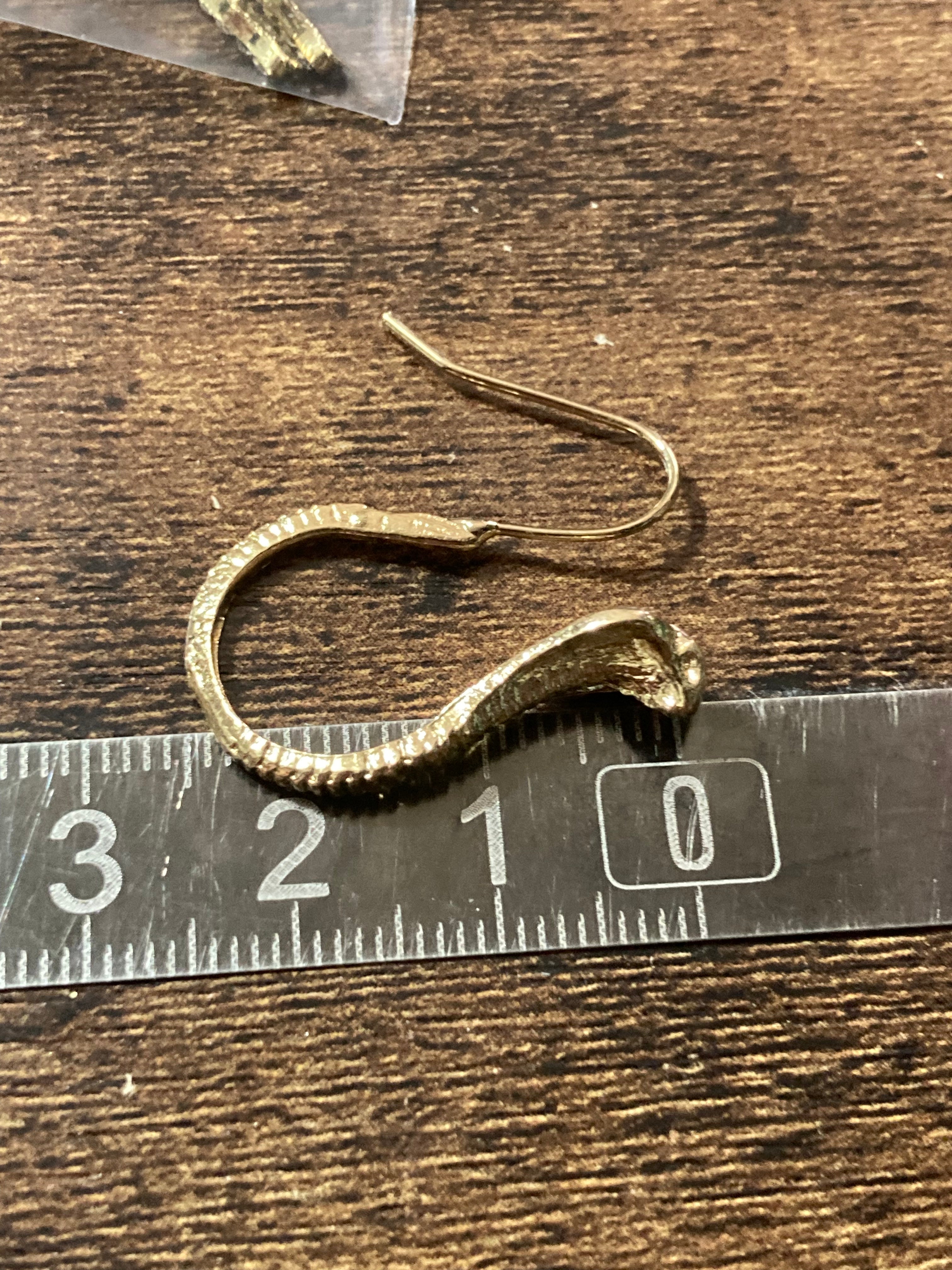 Small gold tone snake earrings