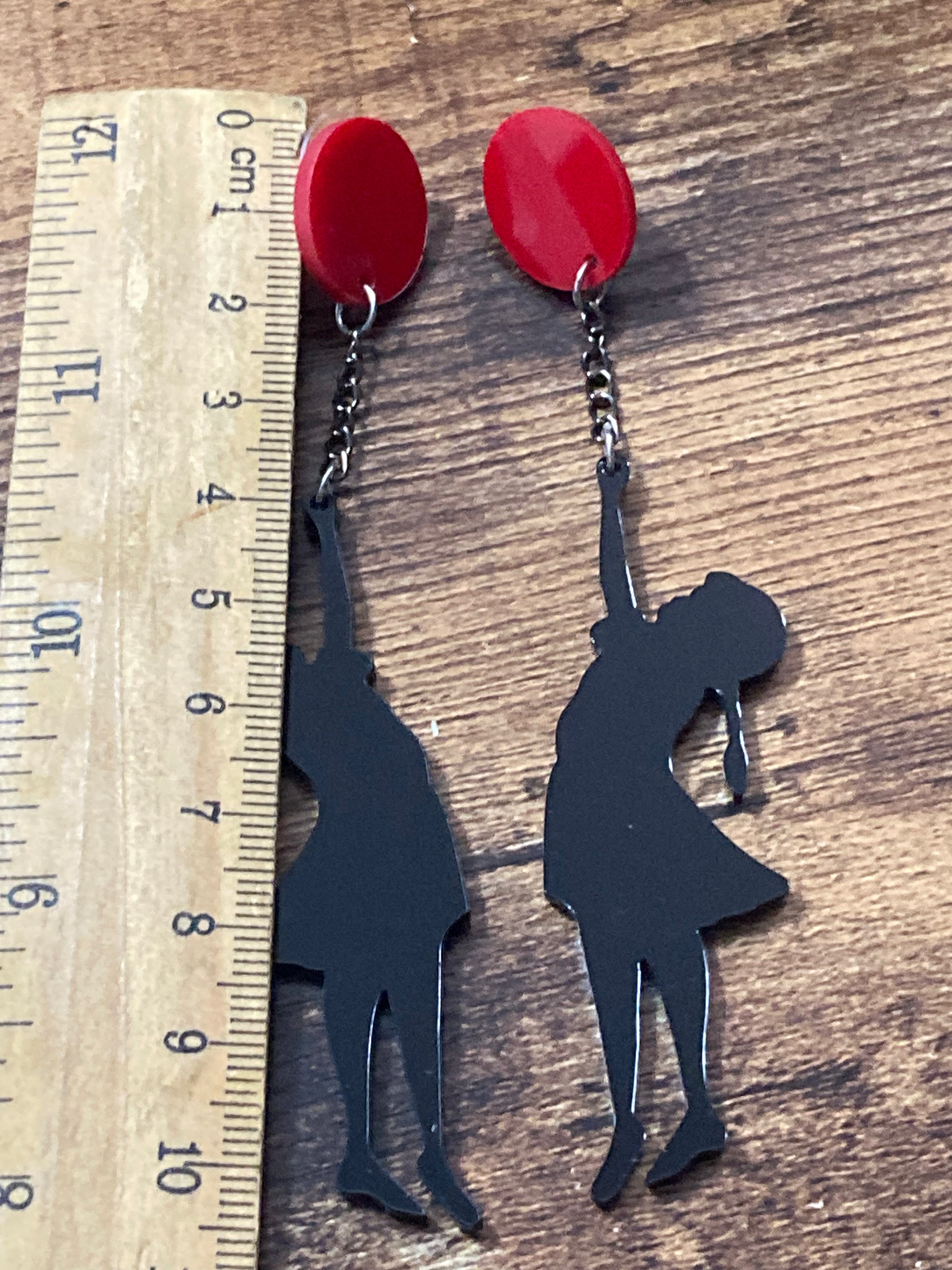 Banksy inspired girl with balloon earrings