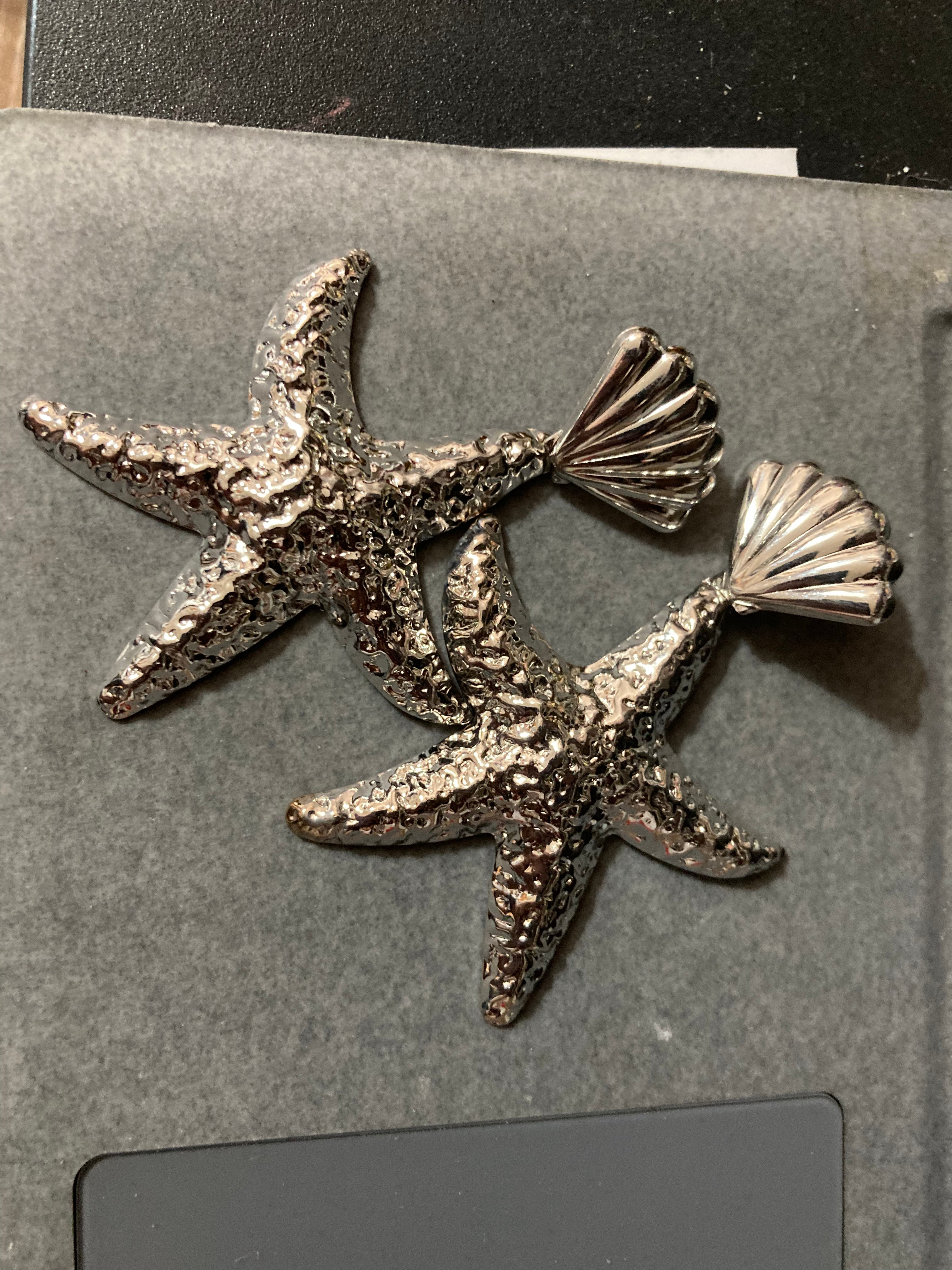 Oversized silver metal starfish earrings