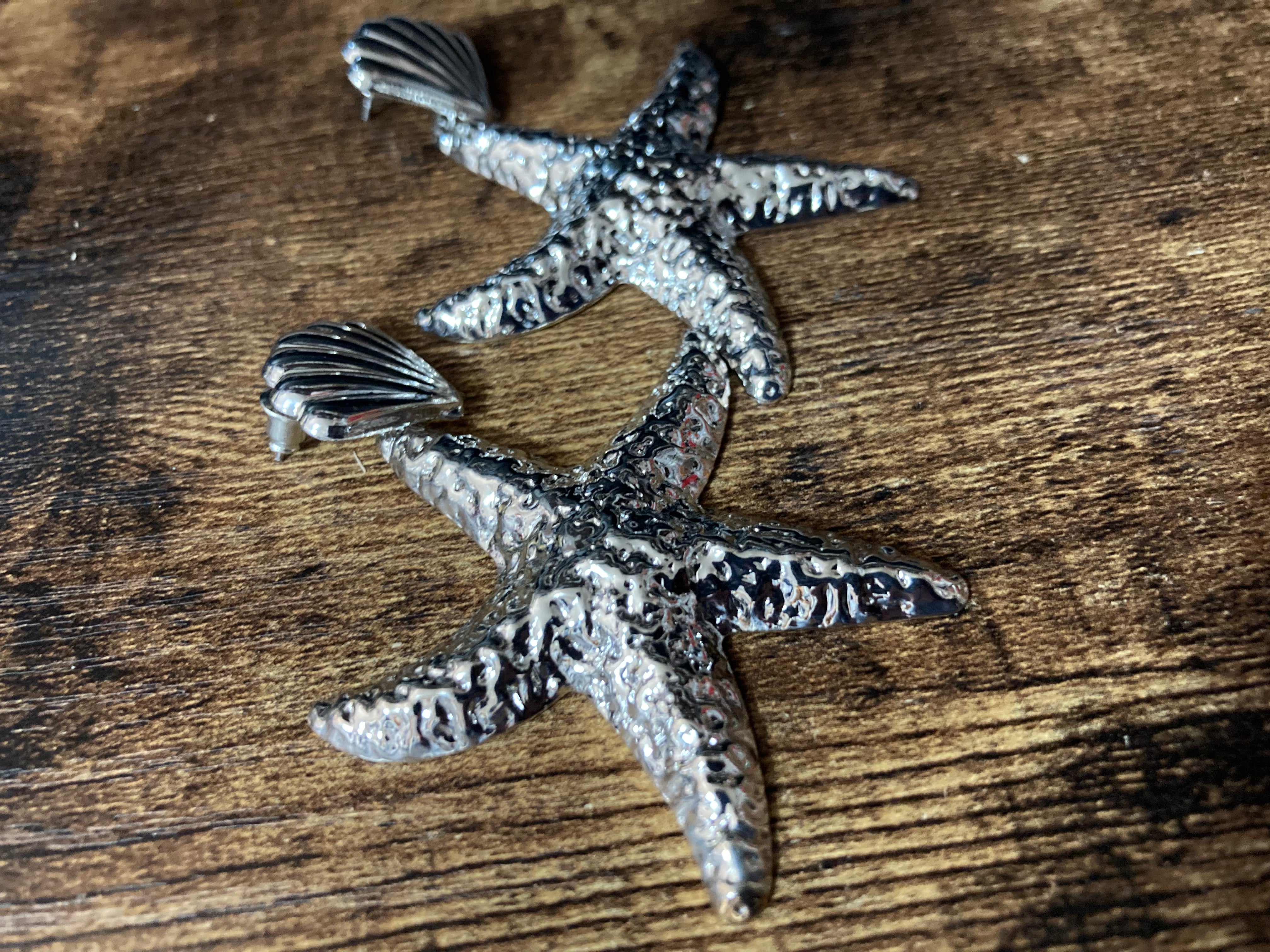 Oversized silver metal starfish earrings