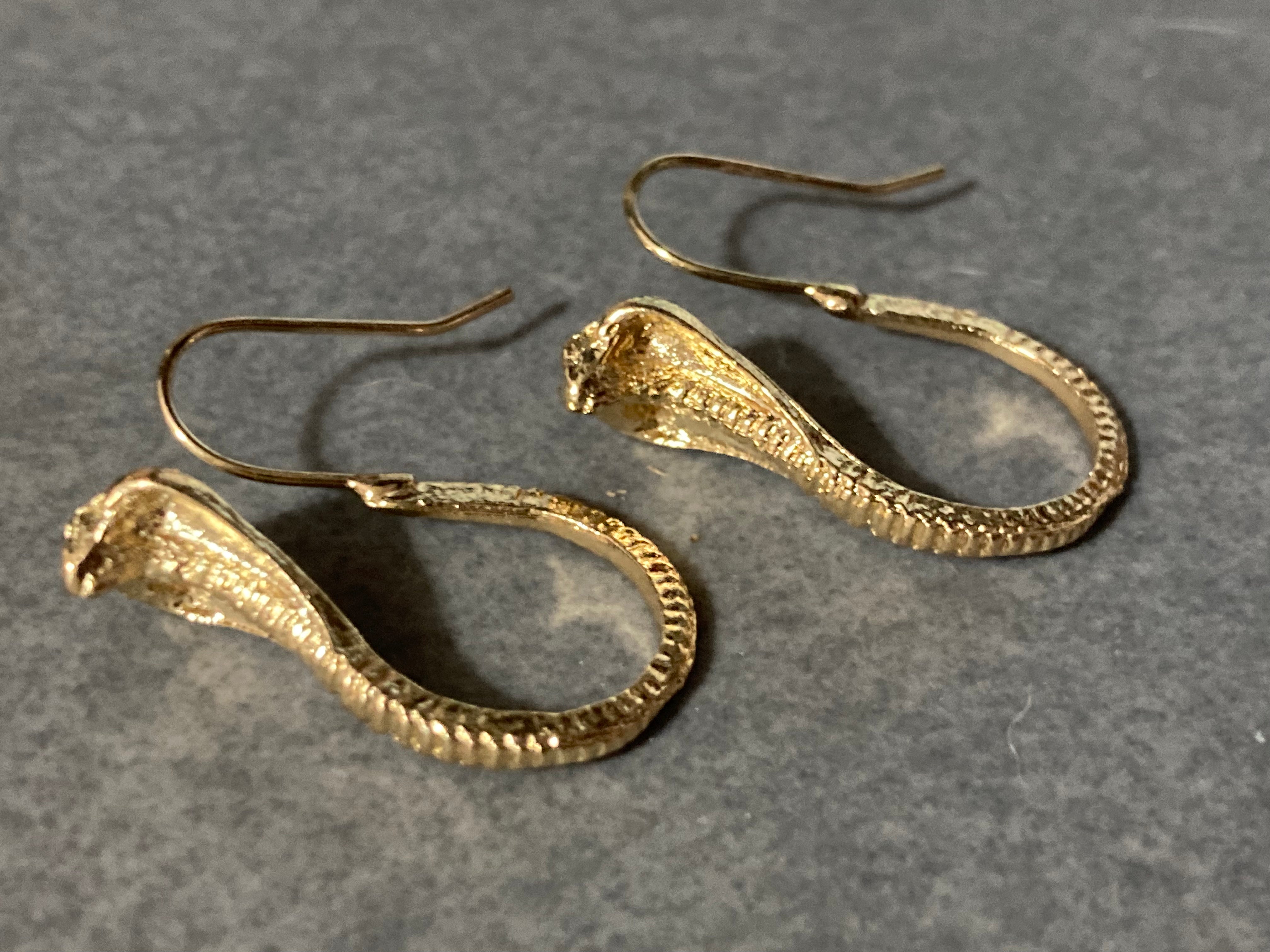 Small gold tone snake earrings