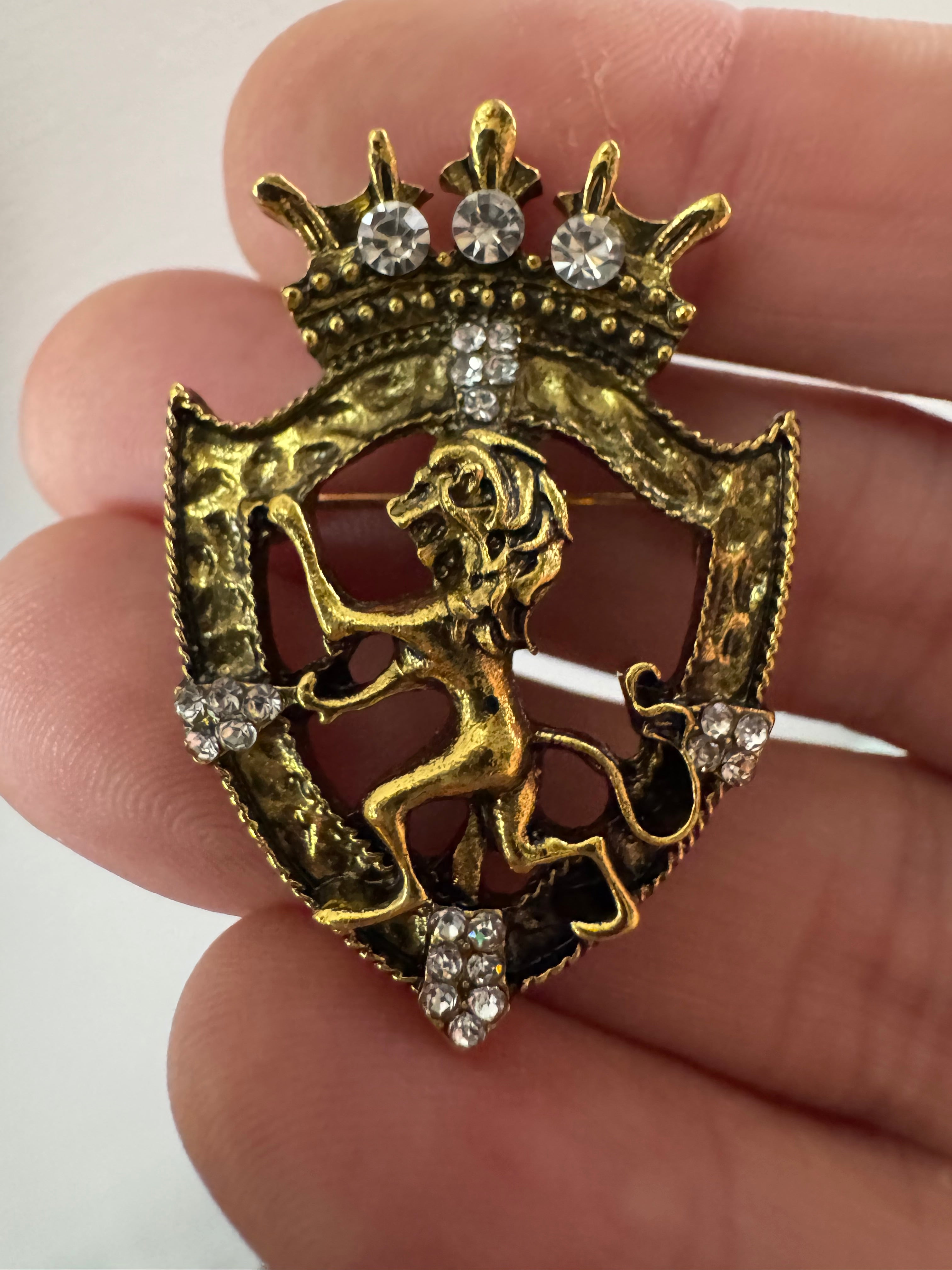 Crystal rampant lion shield brooch, antique gold tone