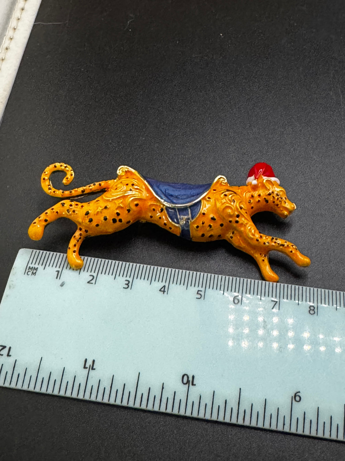Novelty christmas enamel leopard brooch, big cat festive jewellery