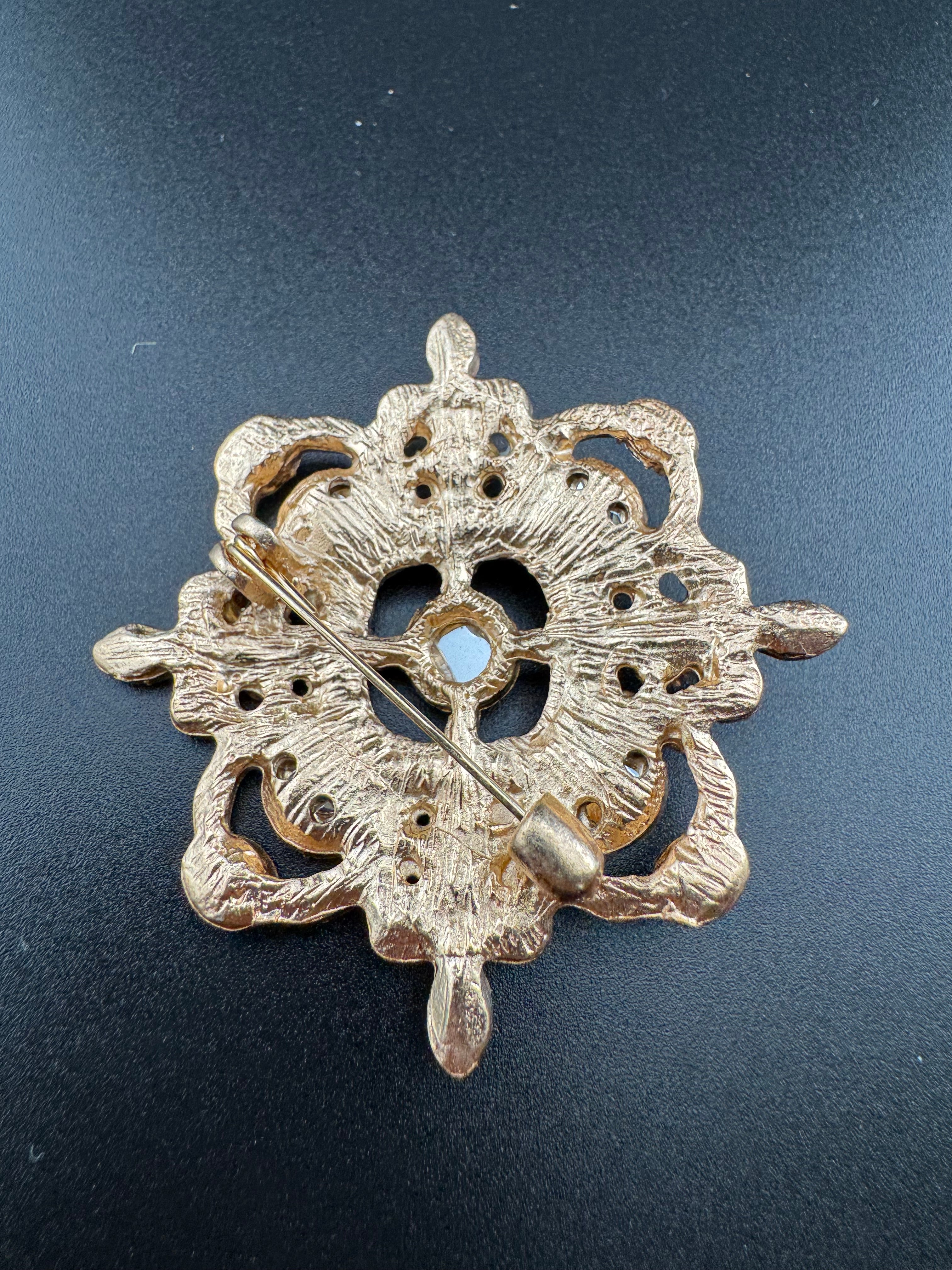 Statement Medieval style gold emerald and sapphire rhinestone cross brooch