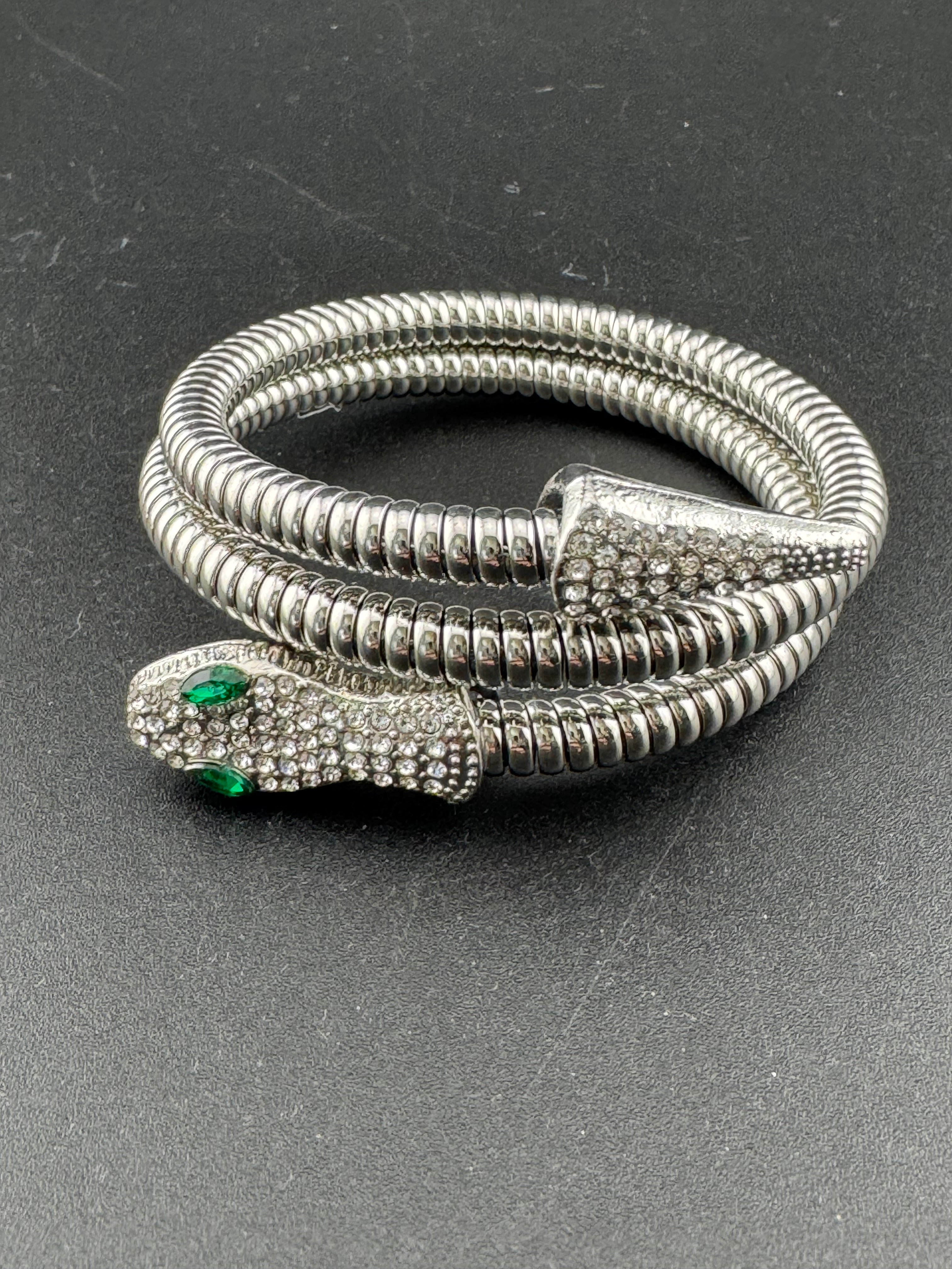 Silver crystal bendy wrap around snake bracelet with emerald eyes
