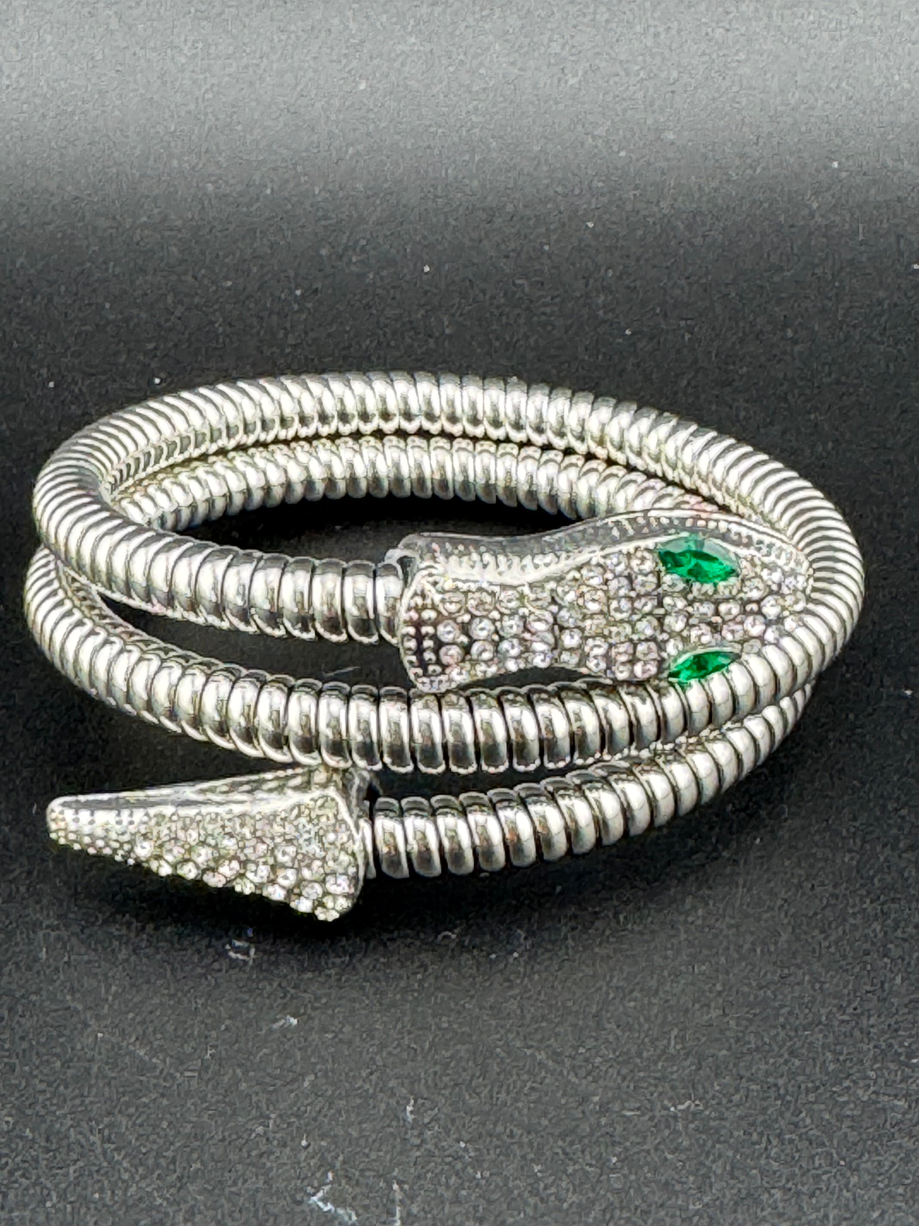Silver crystal bendy wrap around snake bracelet with emerald eyes