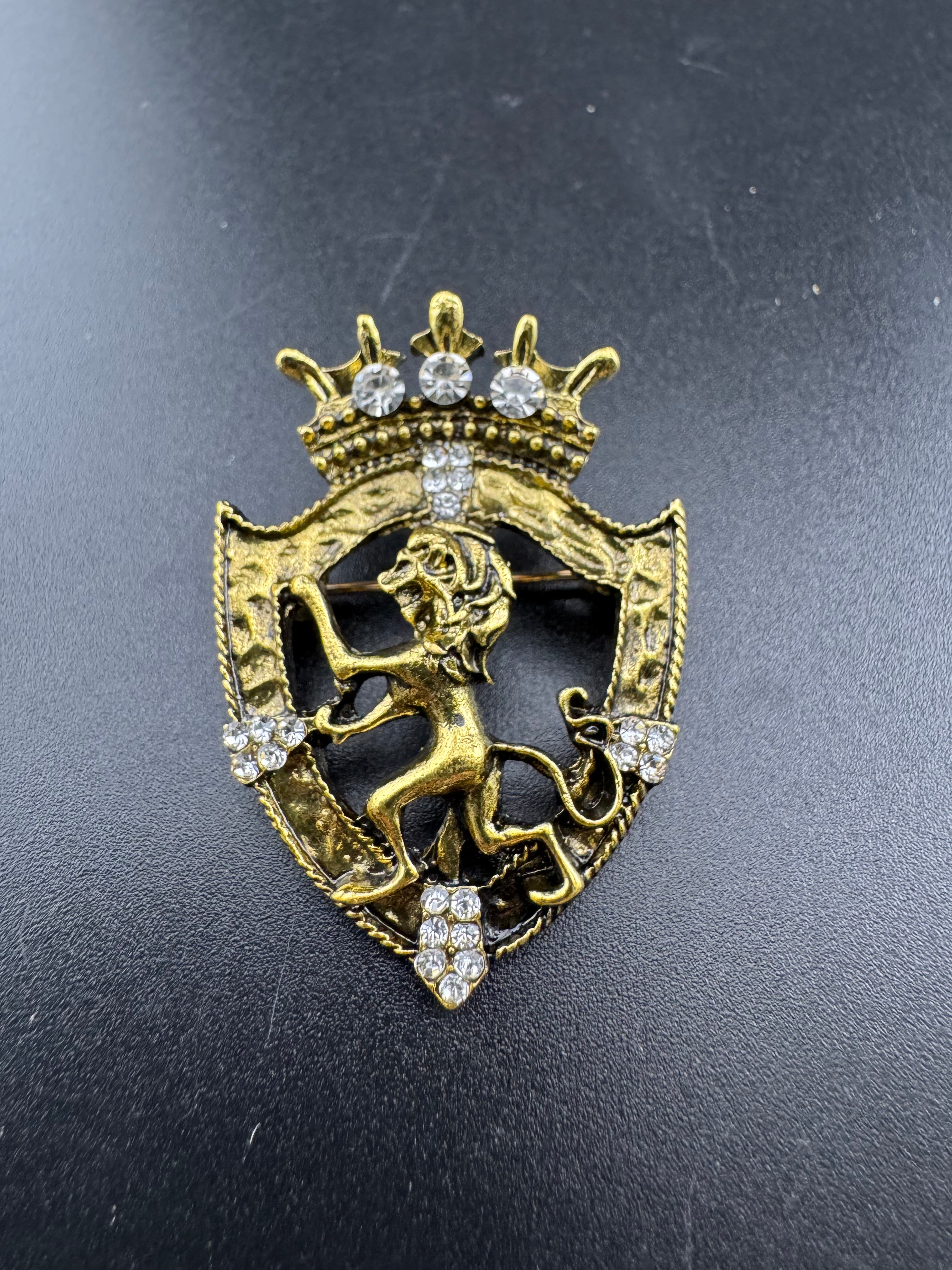 Crystal rampant lion shield brooch, antique gold tone