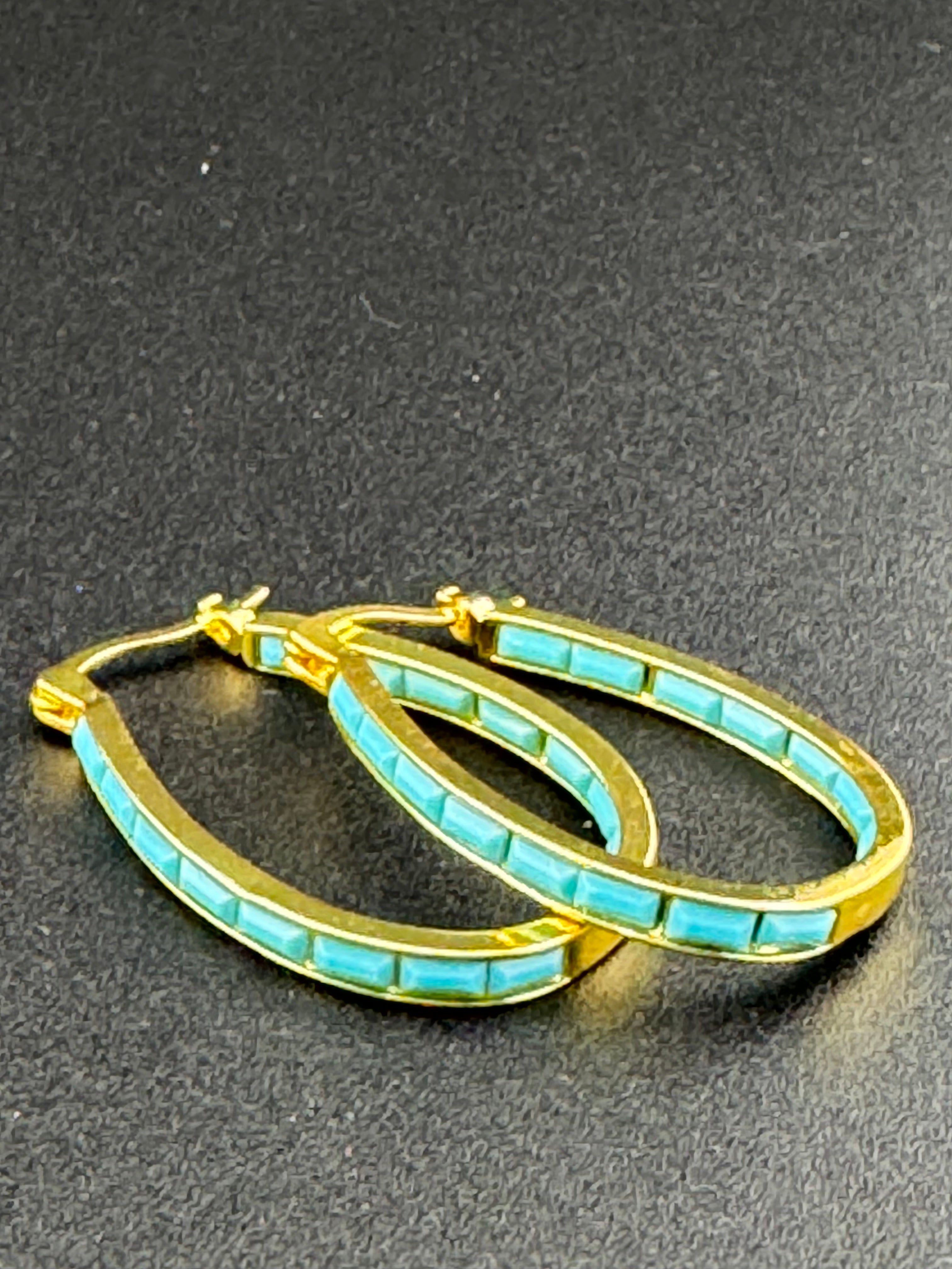 Turquoise blue gold tone oval hoop earrings
