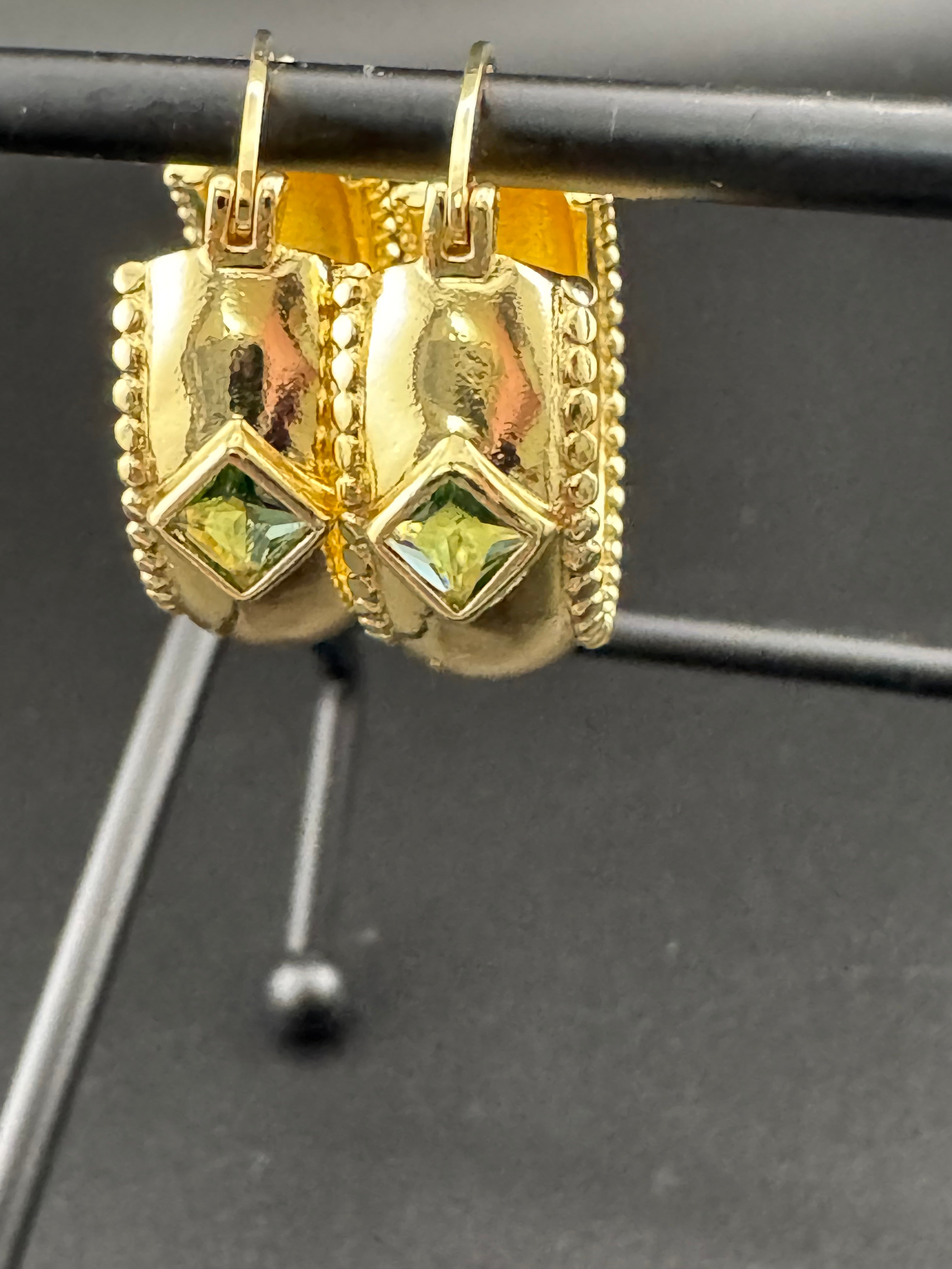 Wide crystal gold hoop earrings with pink emerald and tourmaline crystals