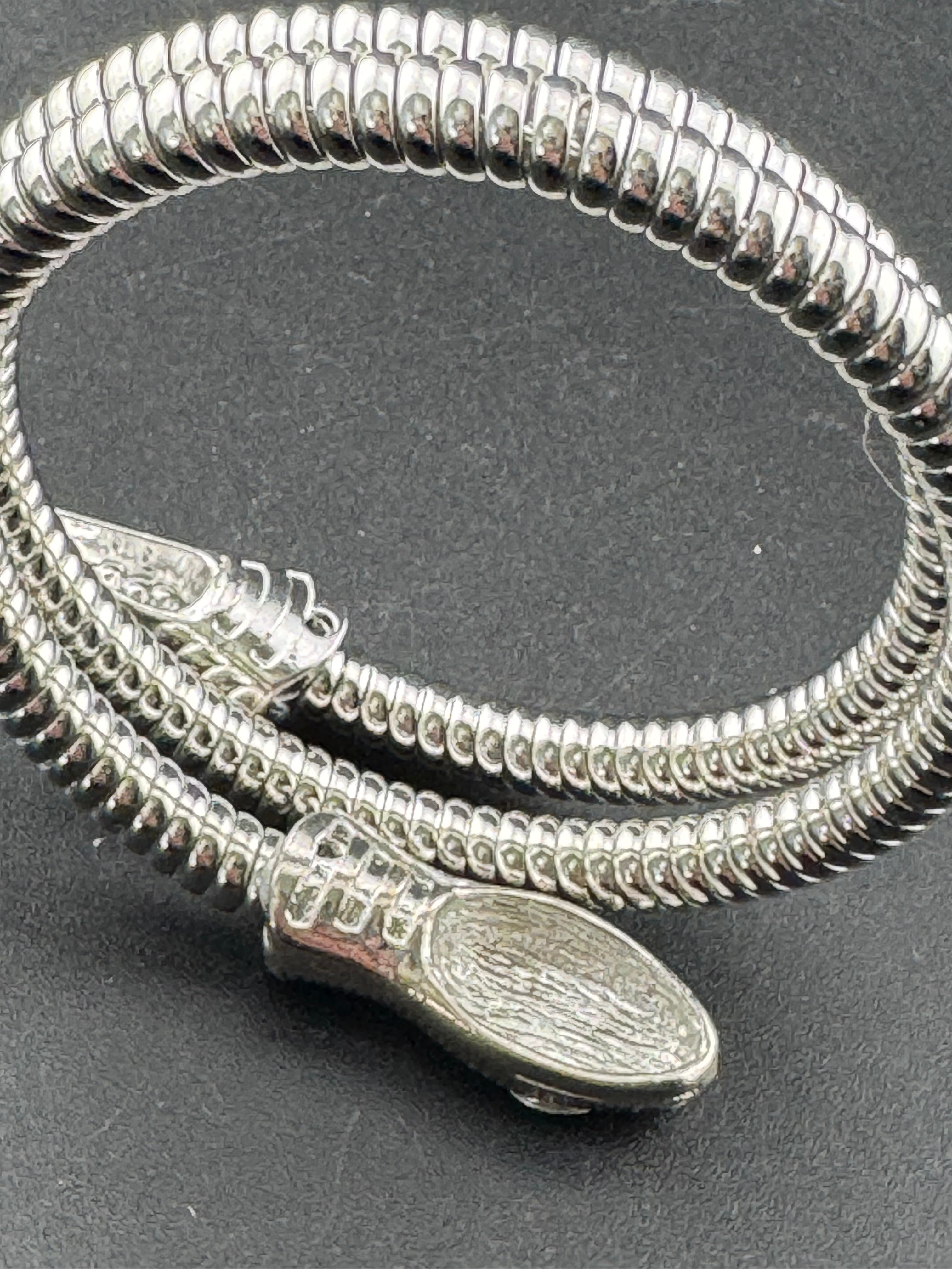 Silver crystal bendy wrap around snake bracelet with emerald eyes