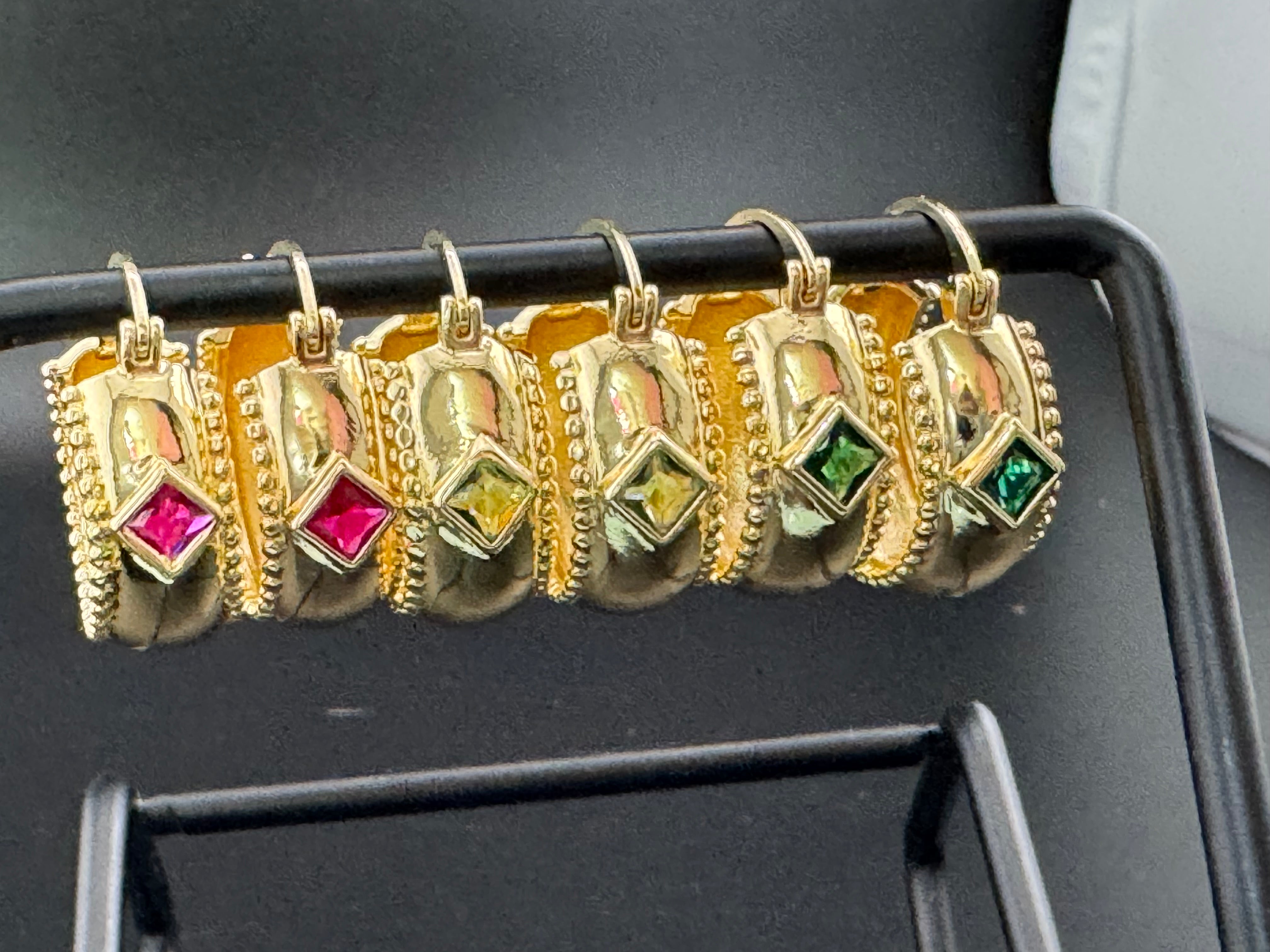 Wide crystal gold hoop earrings with pink emerald and tourmaline crystals