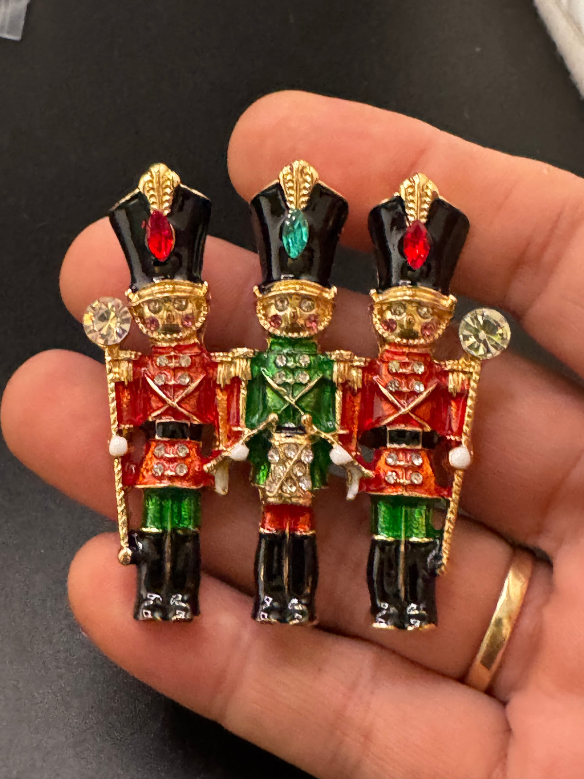 Novelty diamanté nutcracker soldier enamel brooch, red and gold enamel, festive jewellery