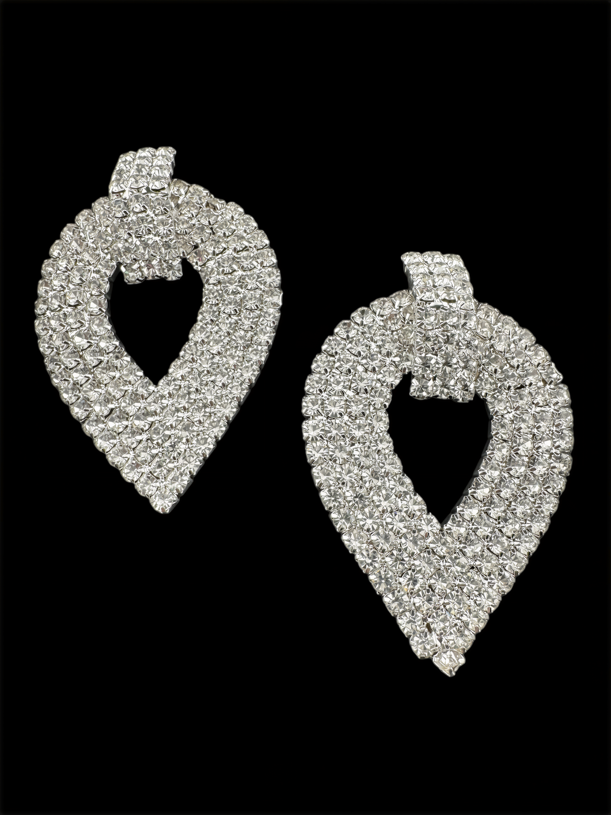 A pair of elegant diamond earrings with a sparkling crystal design.
