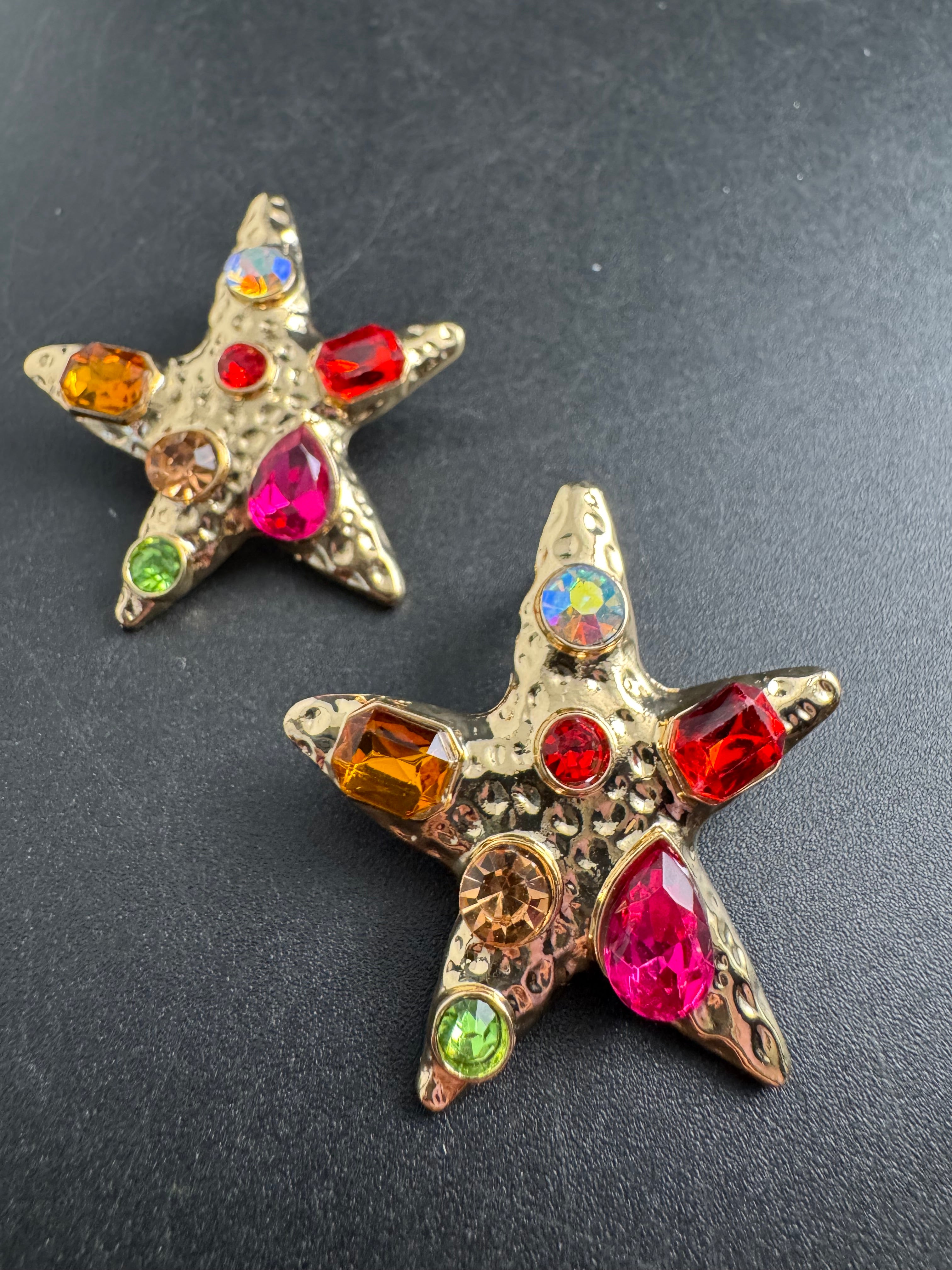 Oversized gold starfish earrings set with rainbow crystals, nautical jewellery