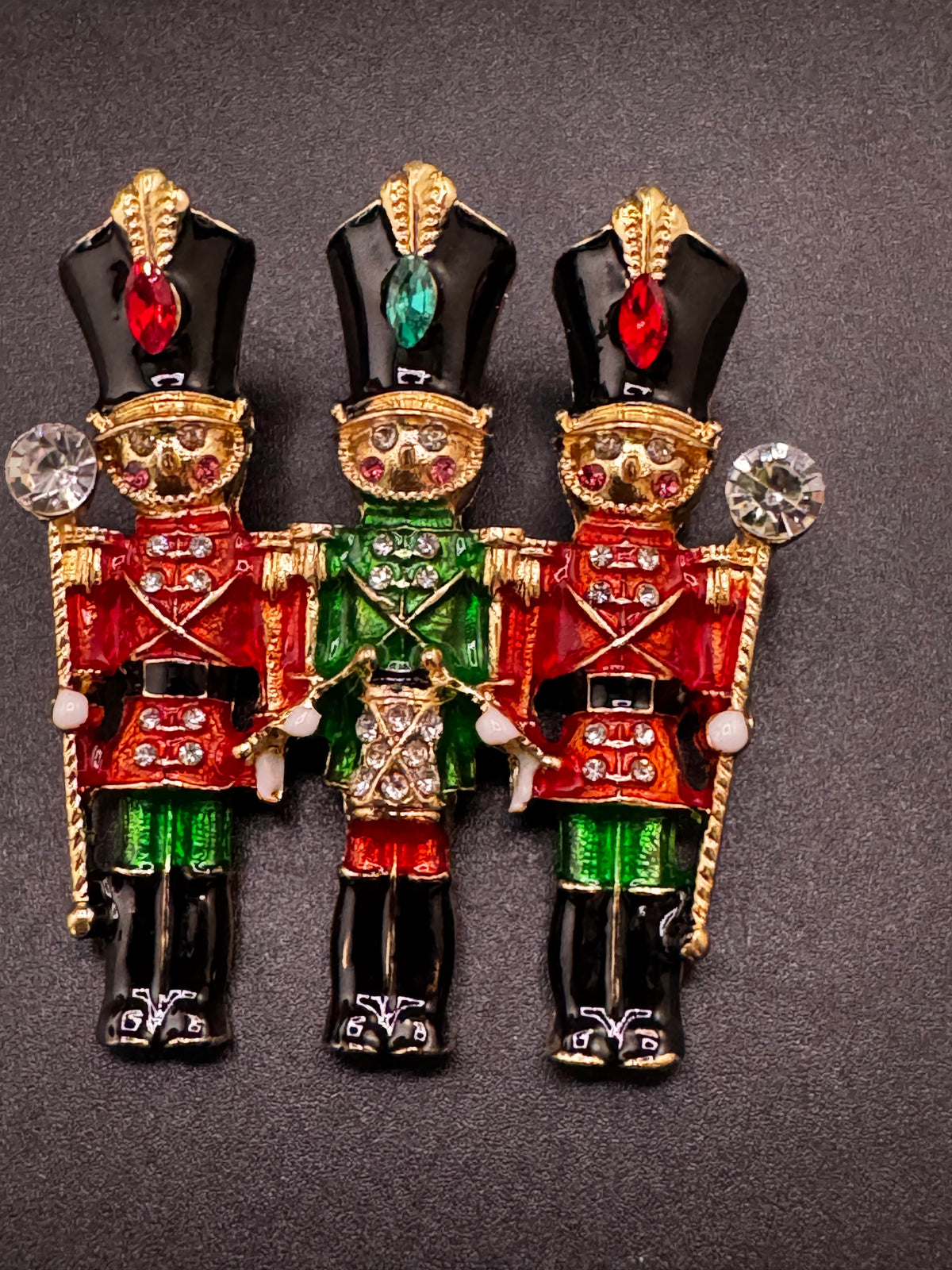 Novelty diamanté nutcracker soldier enamel brooch, red and gold enamel, festive jewellery