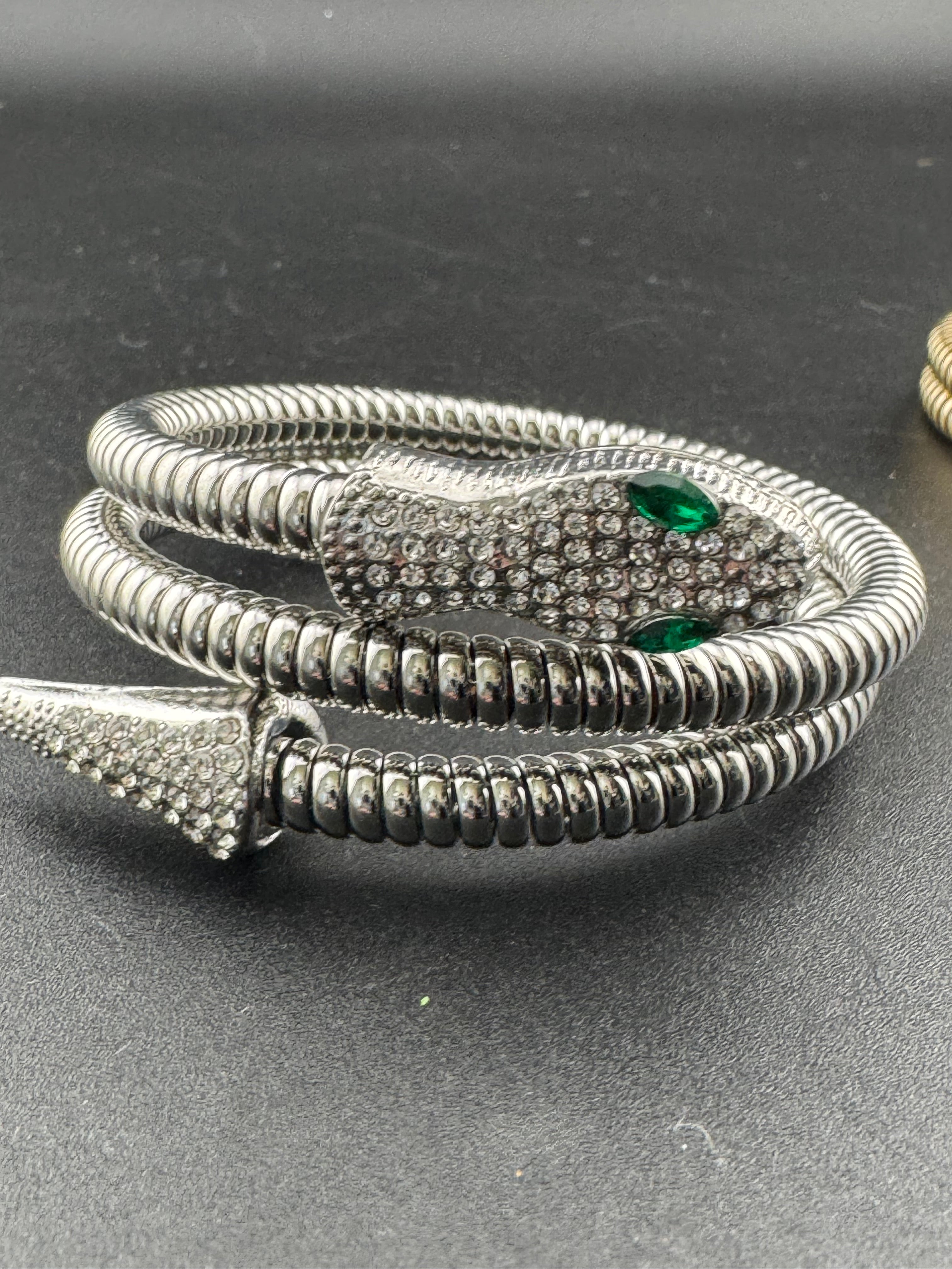 Silver crystal bendy wrap around snake bracelet with emerald eyes