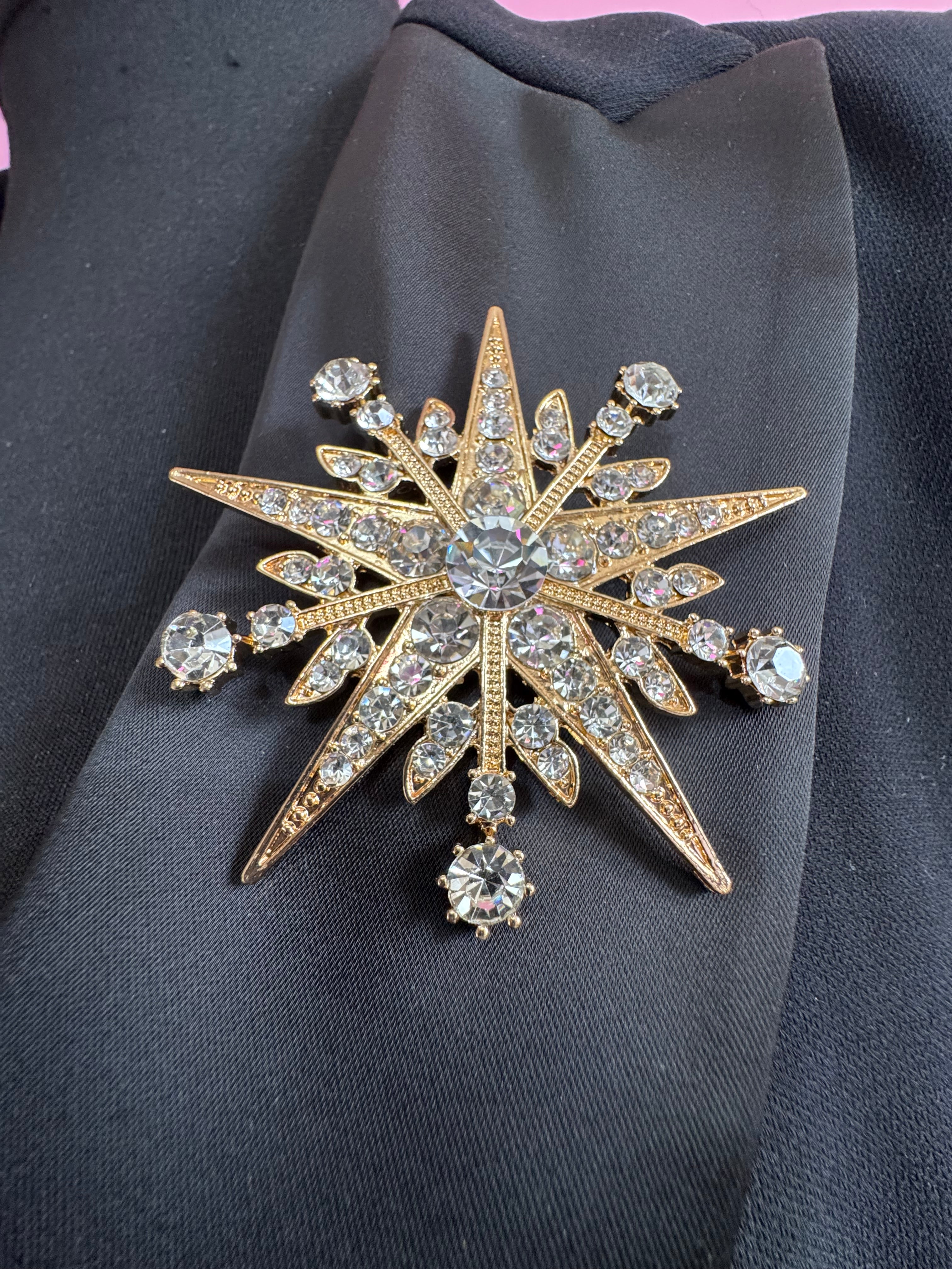 Large diamanté gold star brooch