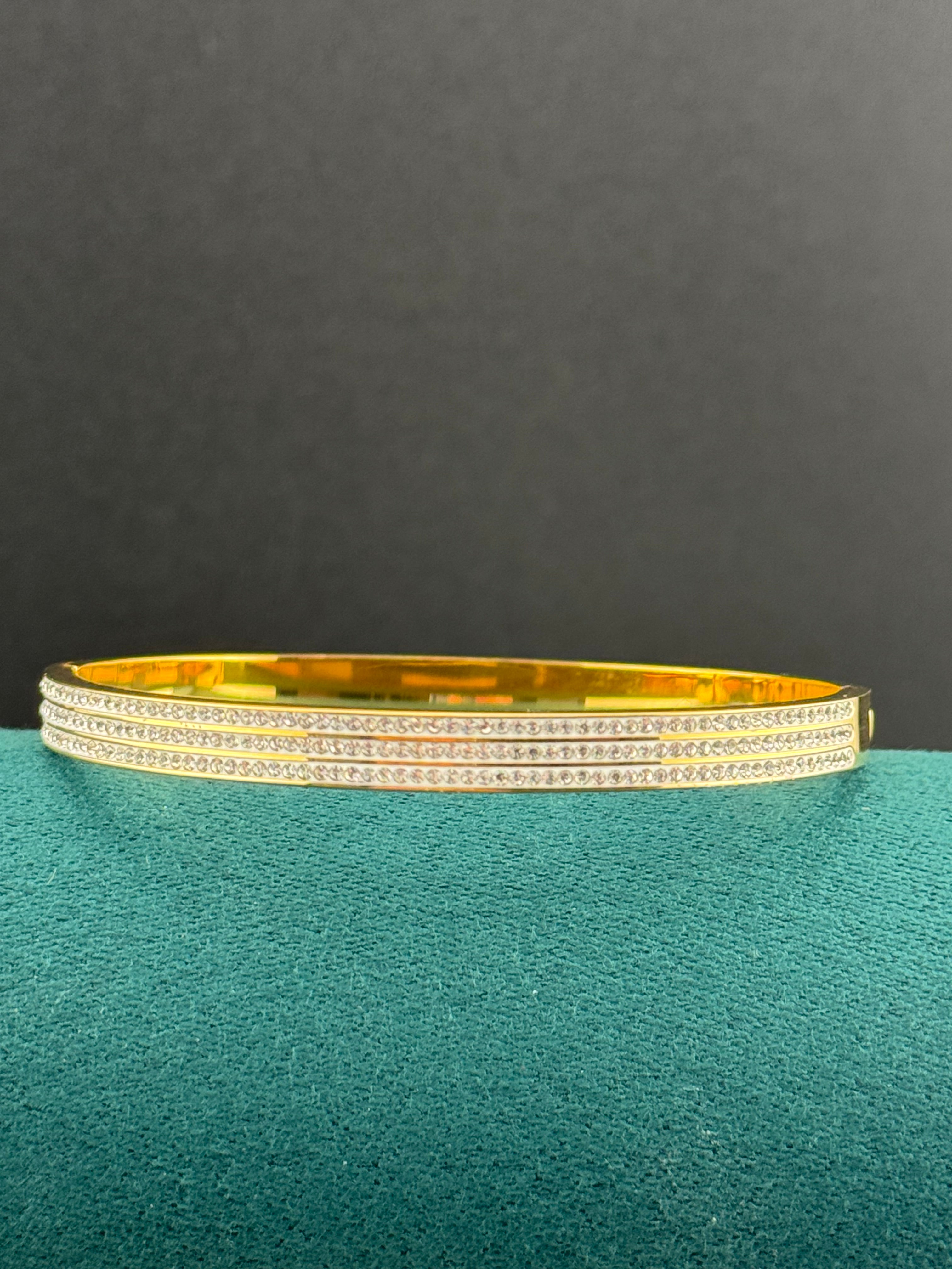 Gold plated high end triple channel set wide clear CZ Crystal hinged clamper bangle bracelet
