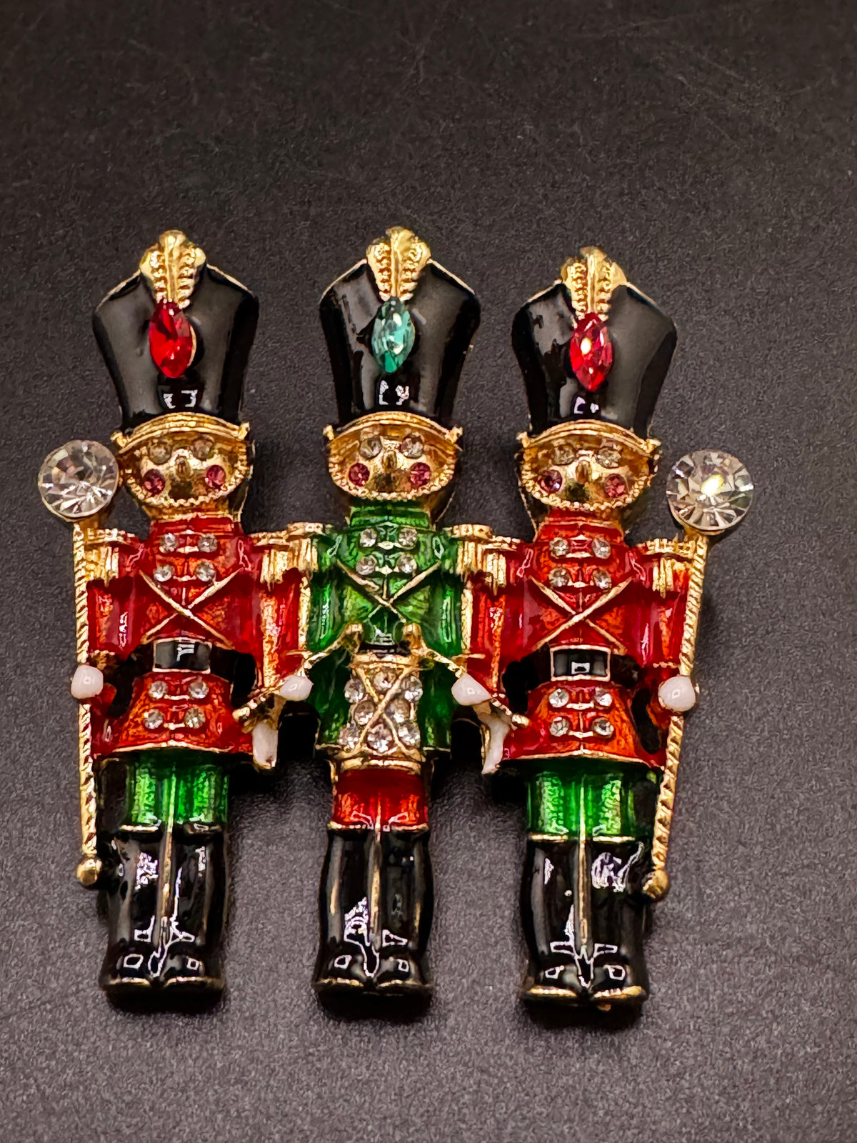 Novelty diamanté nutcracker soldier enamel brooch, red and gold enamel, festive jewellery
