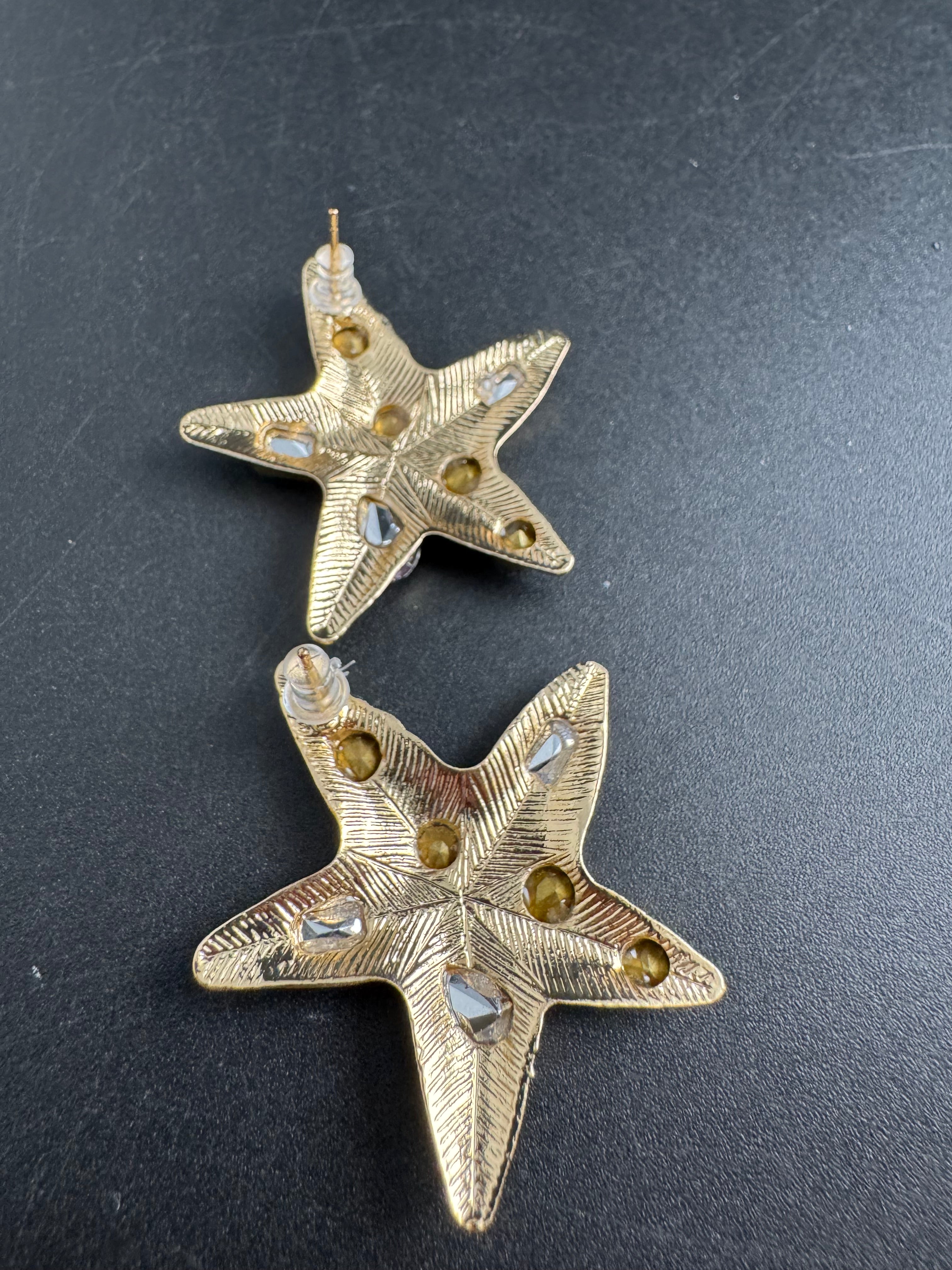 Oversized gold starfish earrings set with rainbow crystals, nautical jewellery