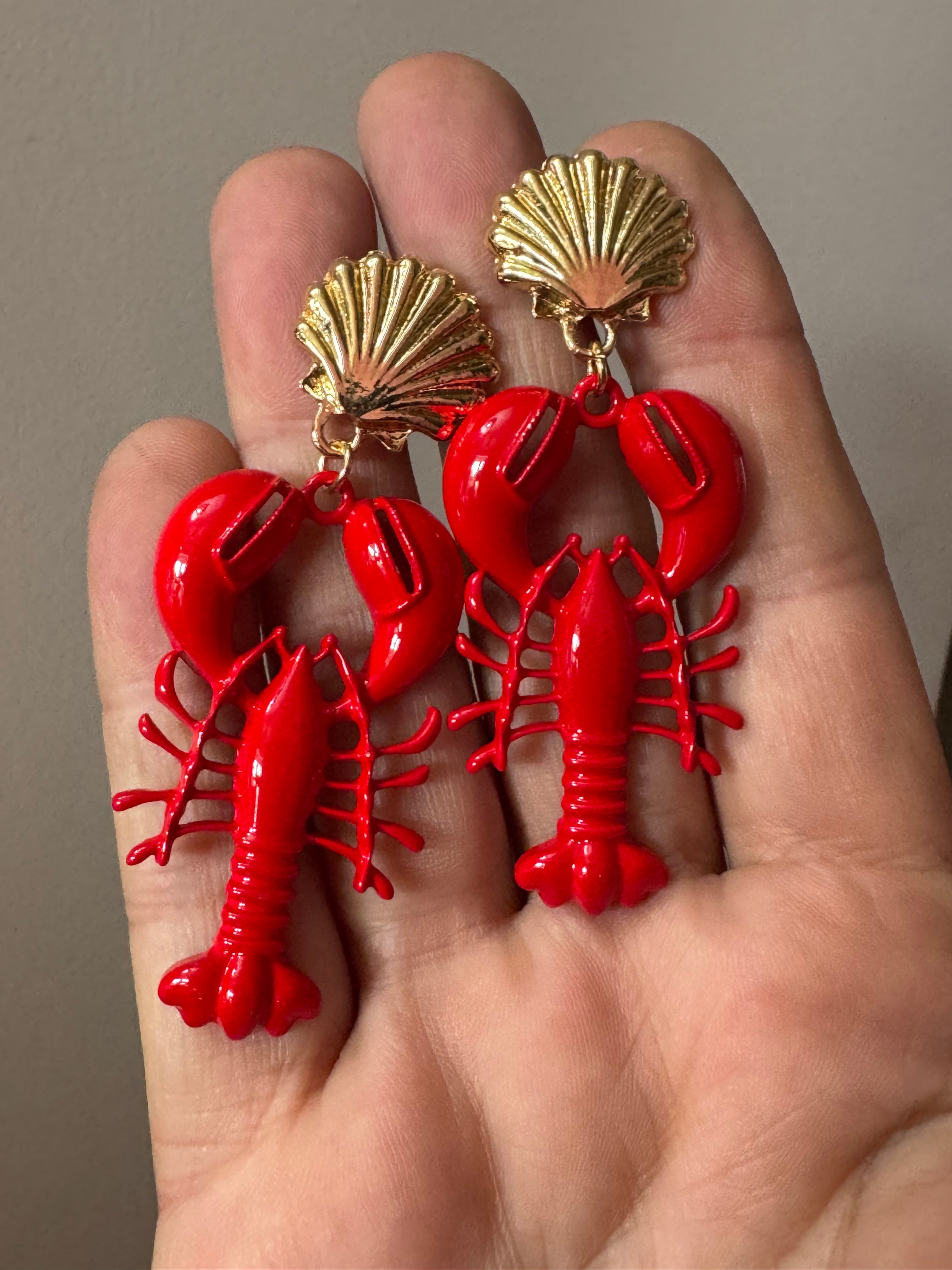 Bright red enamel lobster dangly earrings with gold seashells