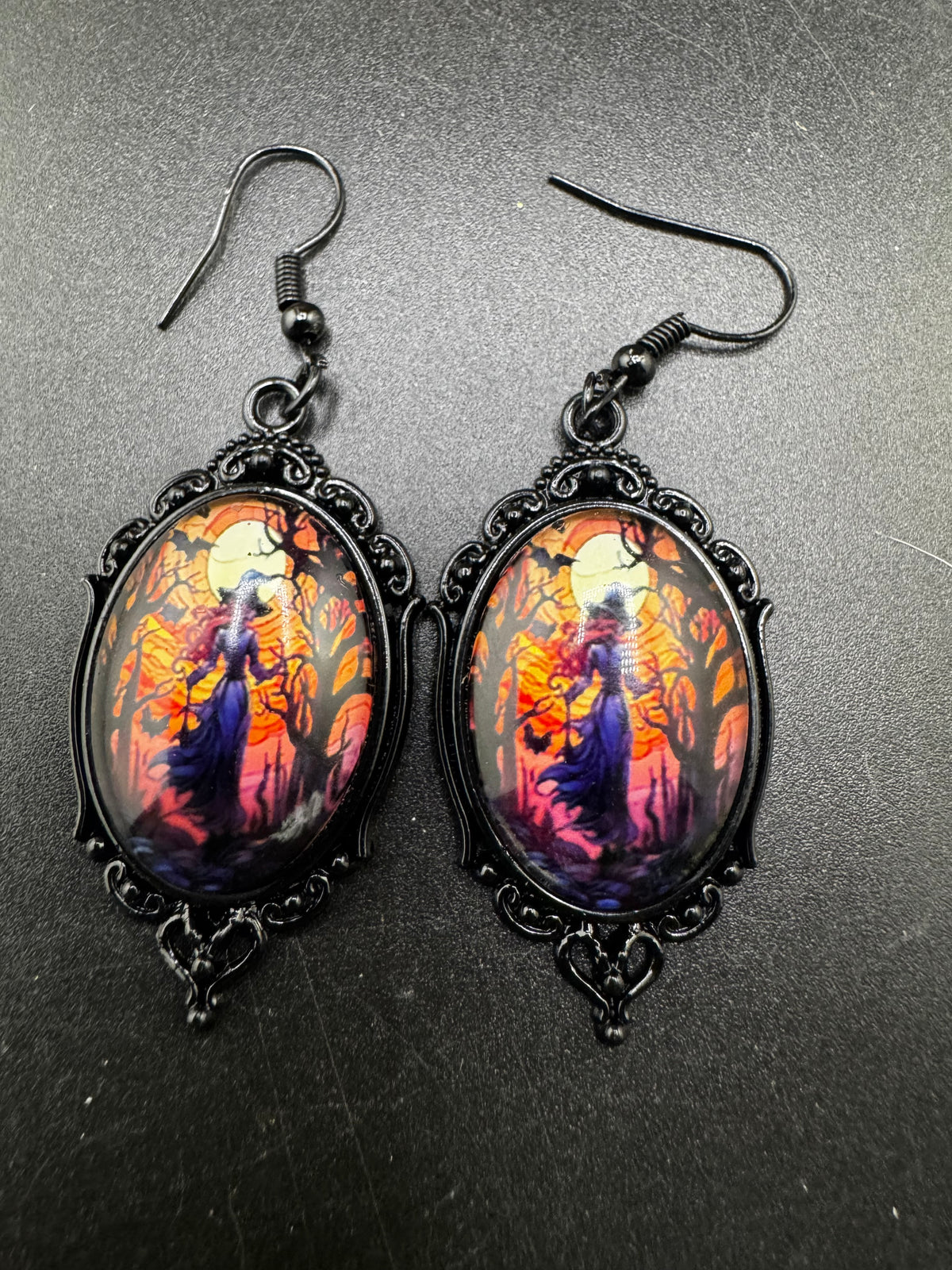 Spooky Halloween witch earrings for pierced ears black and orange