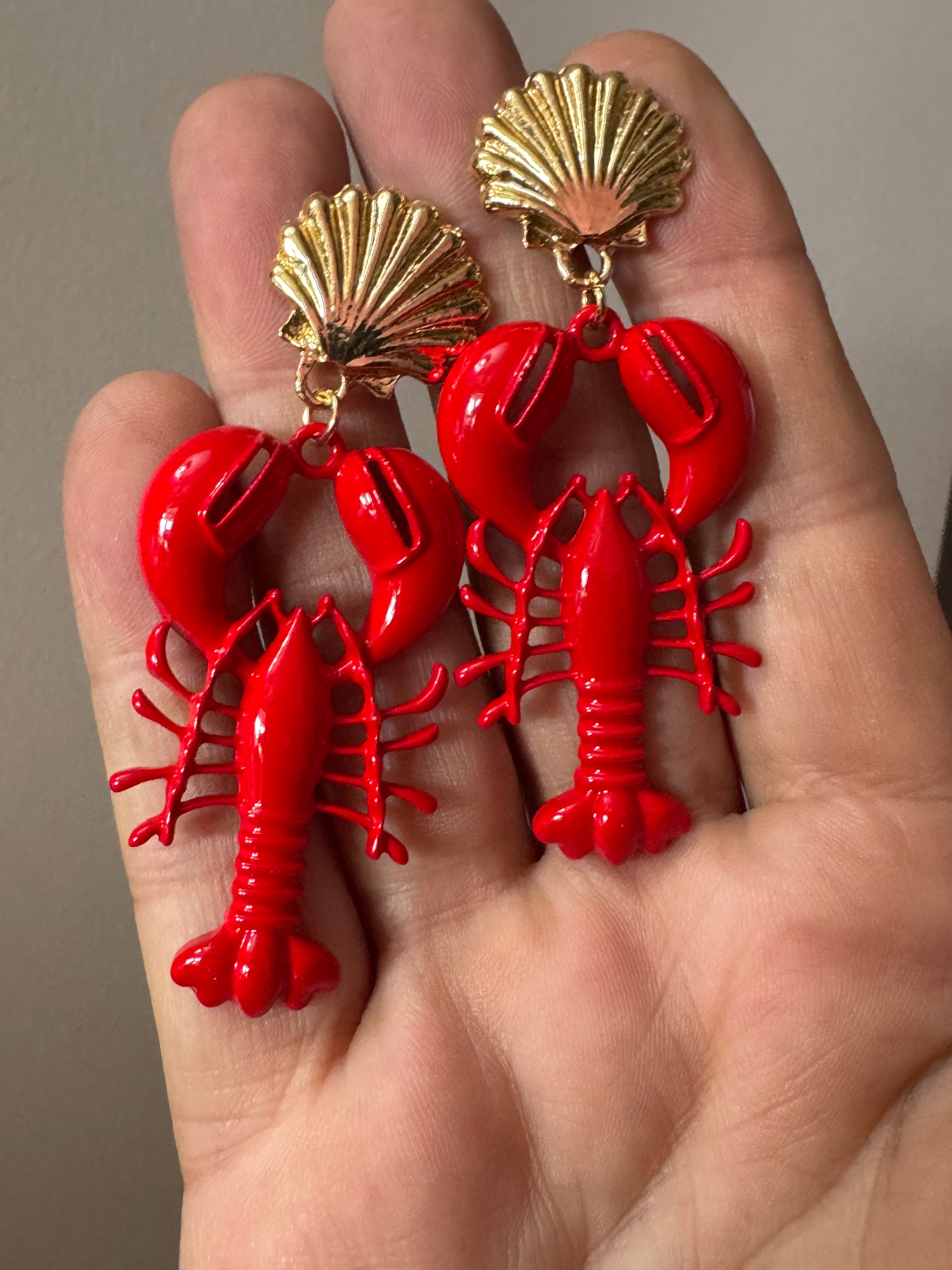 Bright red enamel lobster dangly earrings with gold seashells