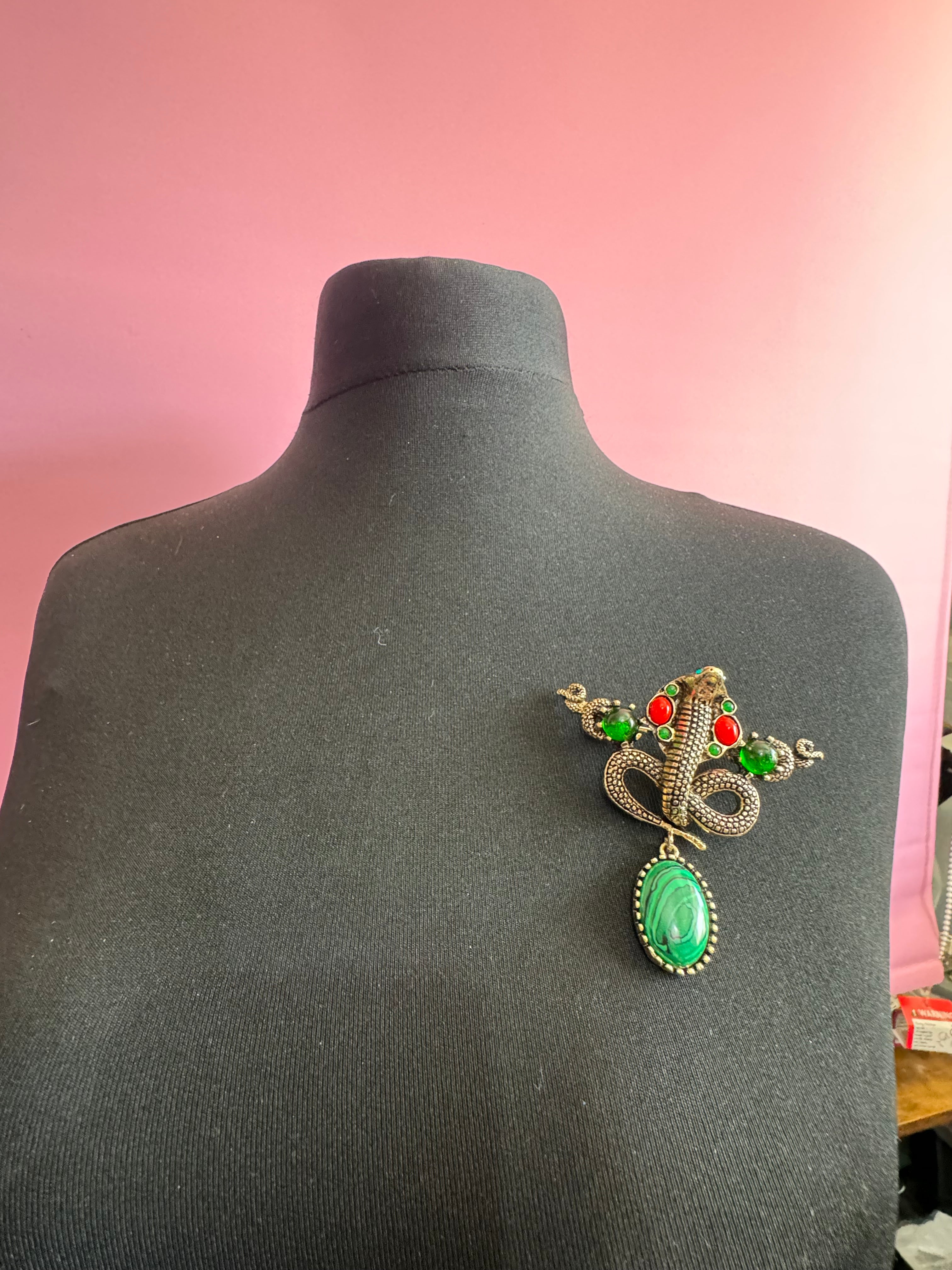 Oversized gold snake brooch with dropper and gemstones