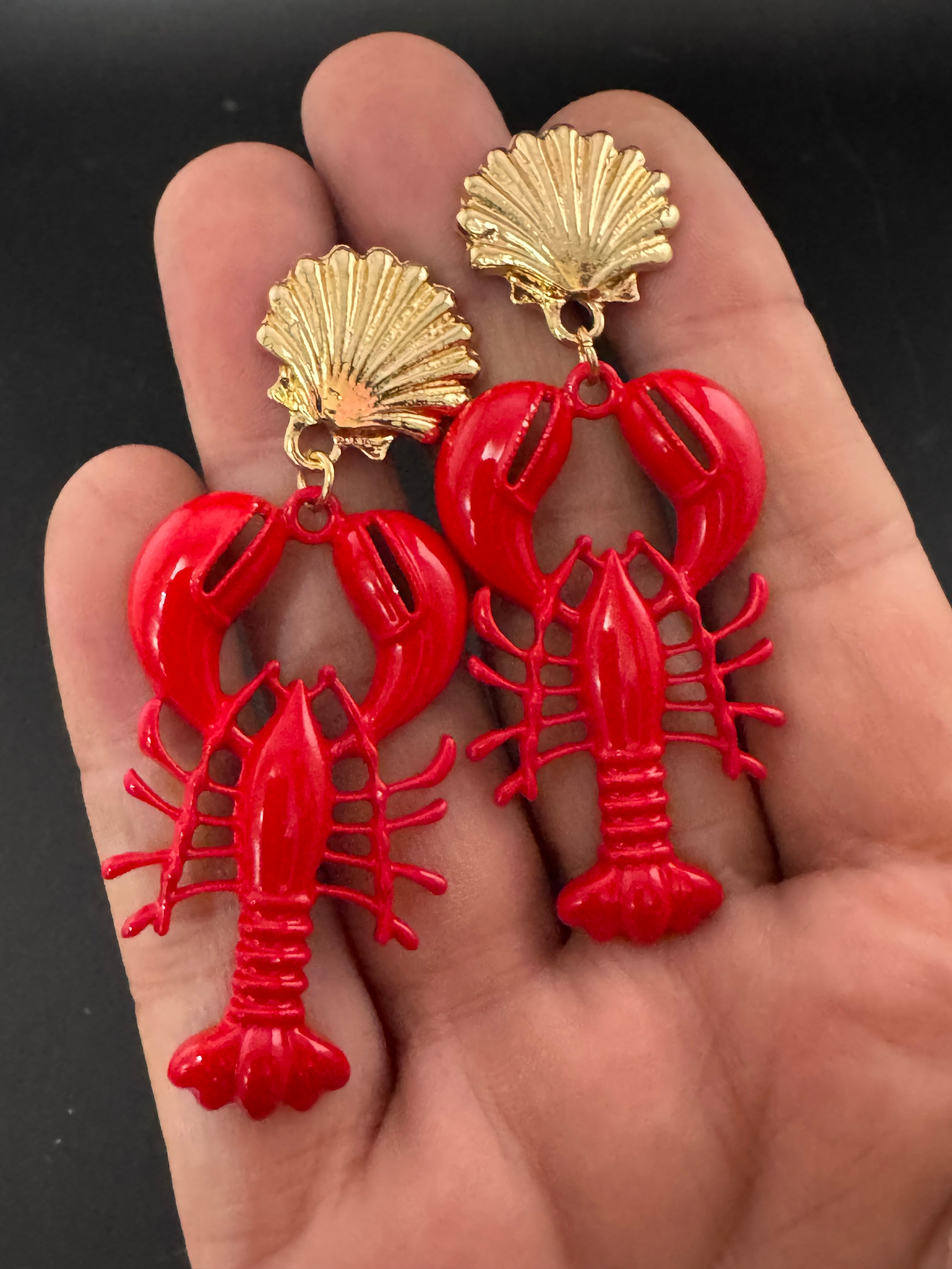 Bright red enamel lobster dangly earrings with gold seashells