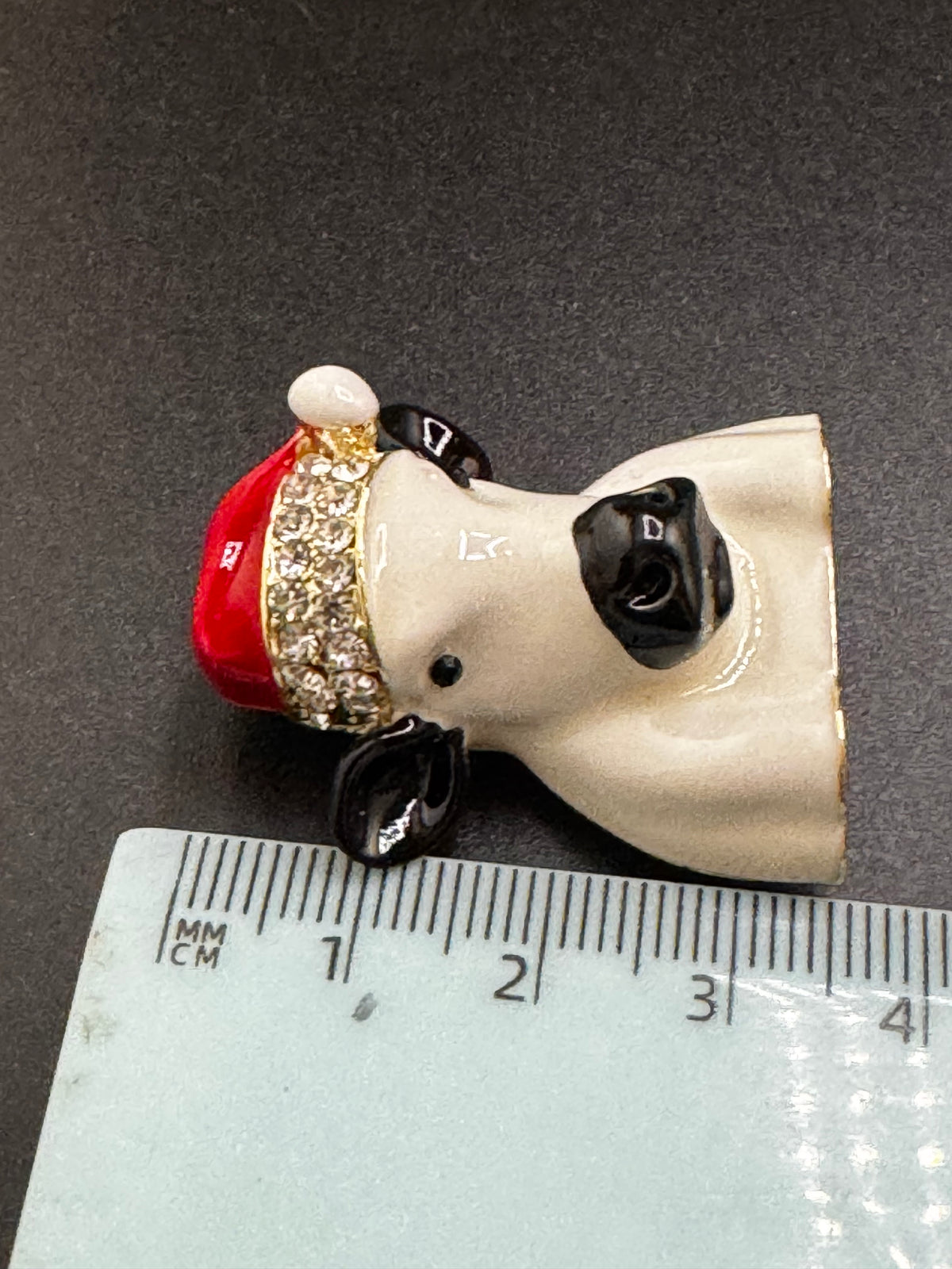 Christmas cow brooch, white enamel novelty Christmas hat with rhinestones, festive jewellery