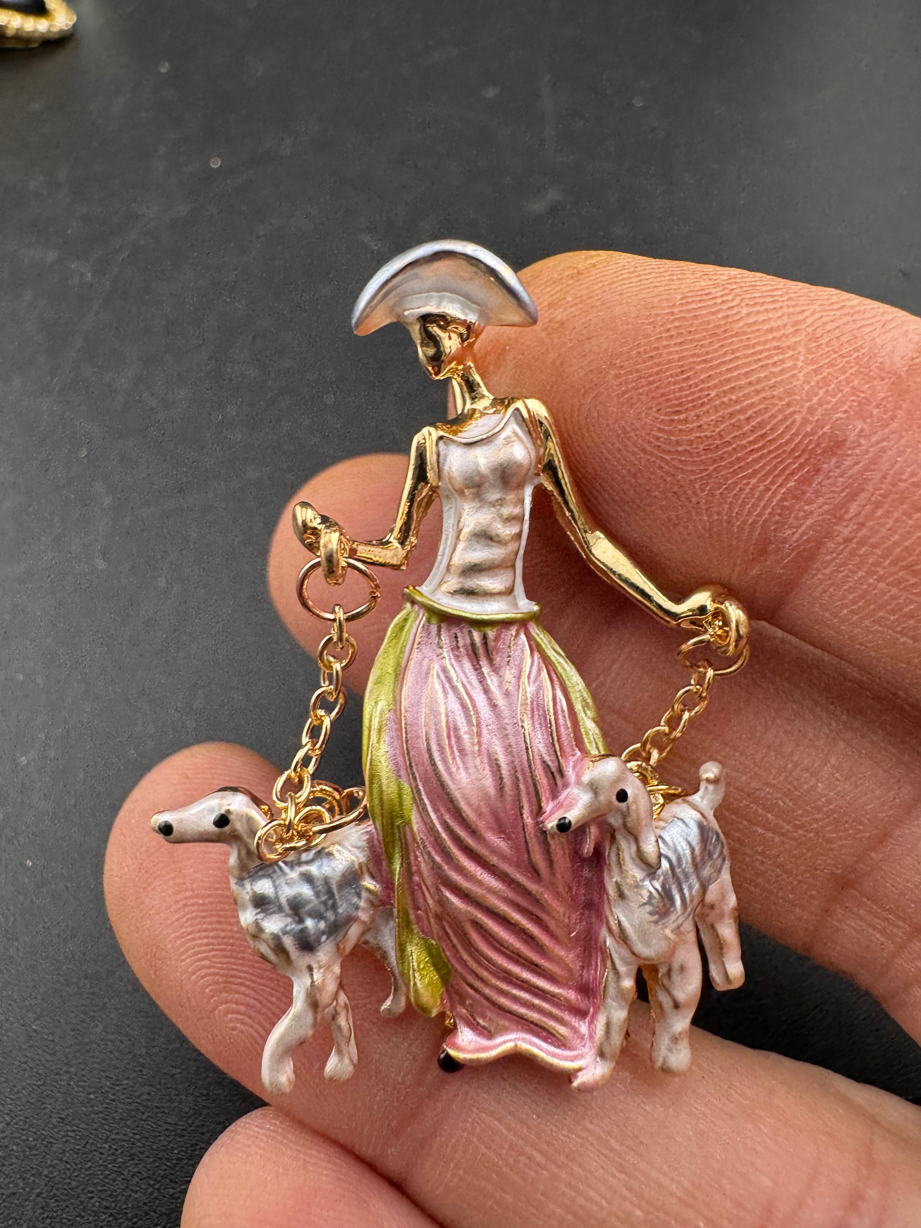 Pink art deco lady with french poodle dogs on leads brooch