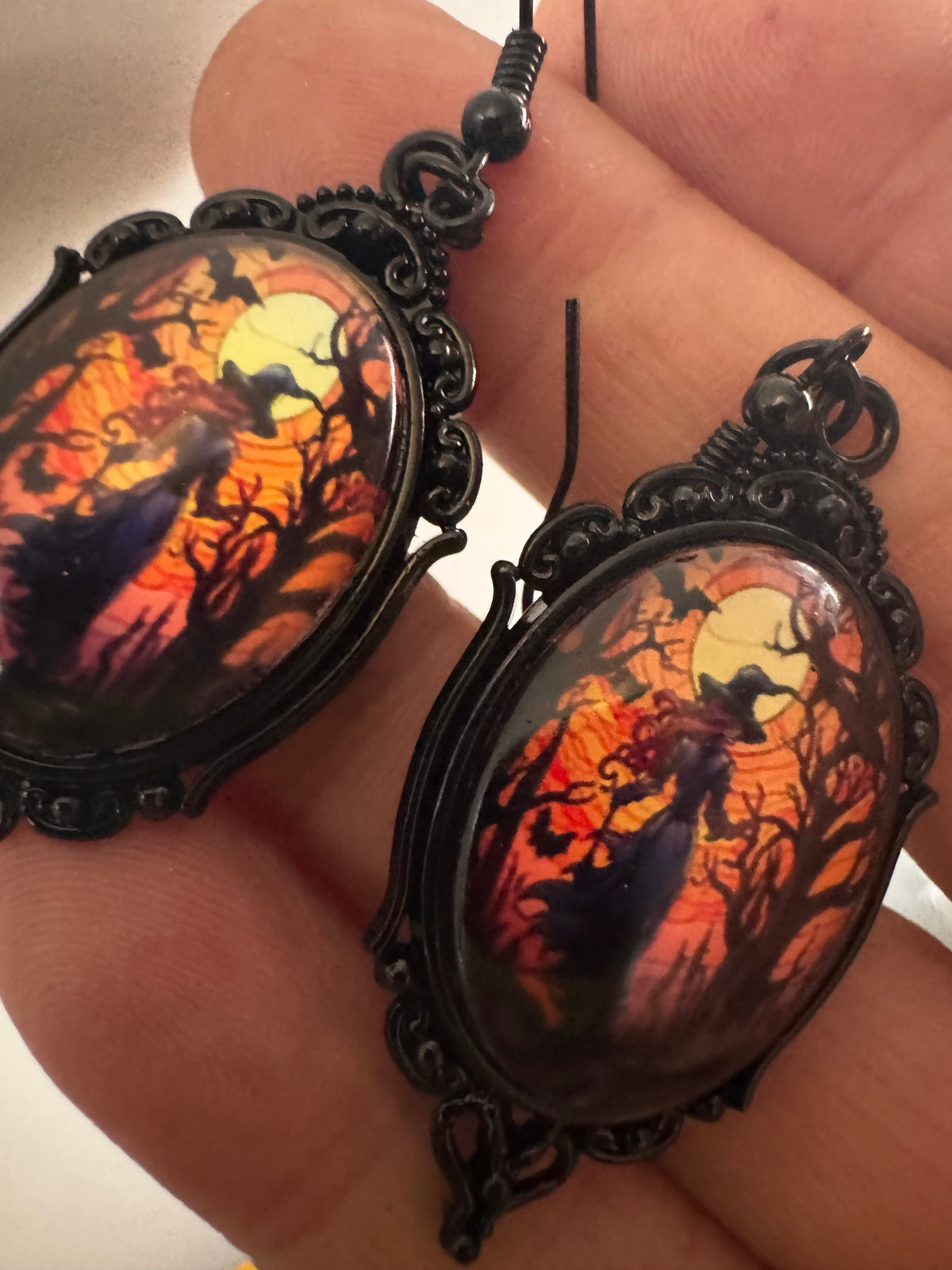 Spooky Halloween witch earrings for pierced ears black and orange