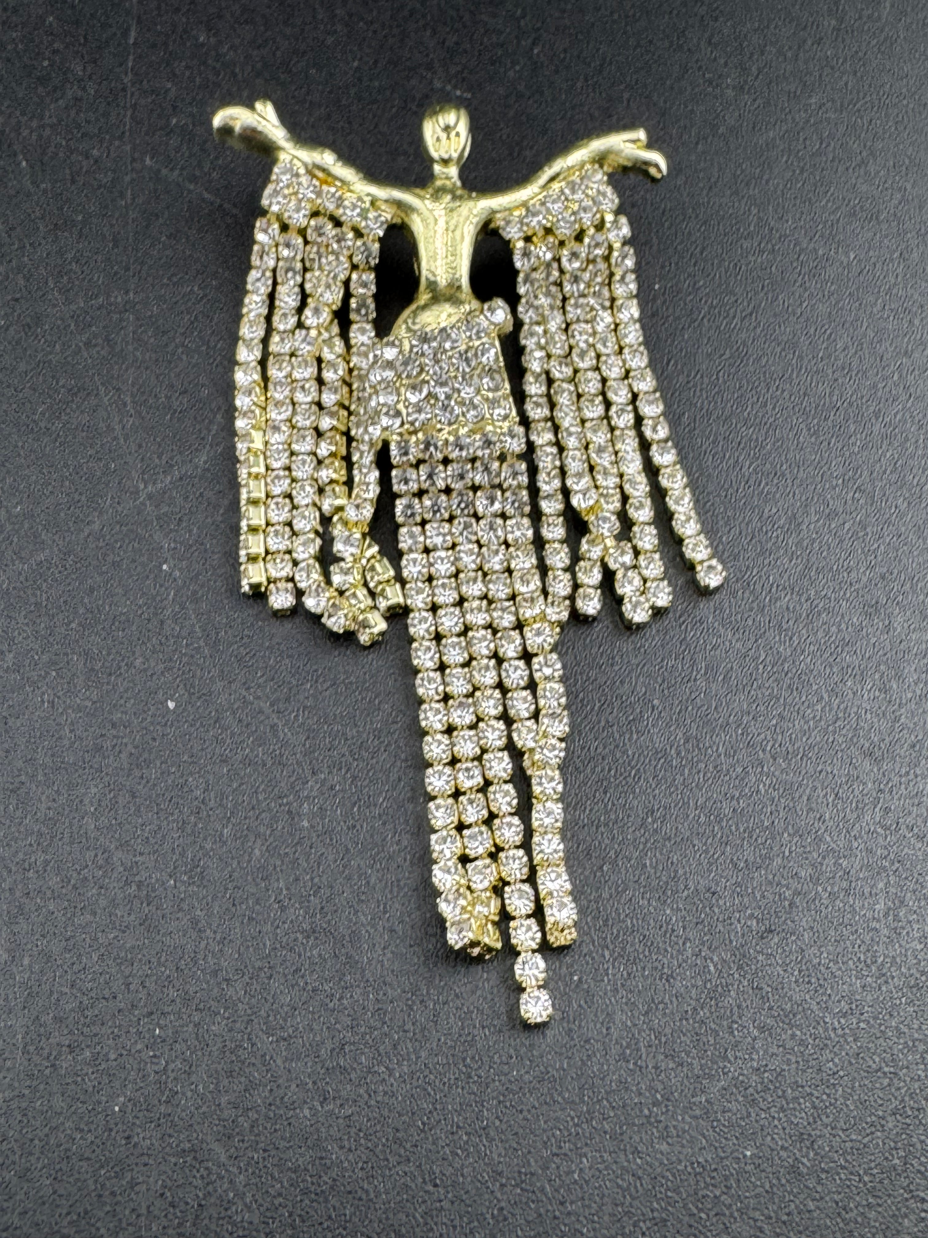 Gold rhinestone diva brooch, diamanté lady waterfall pin