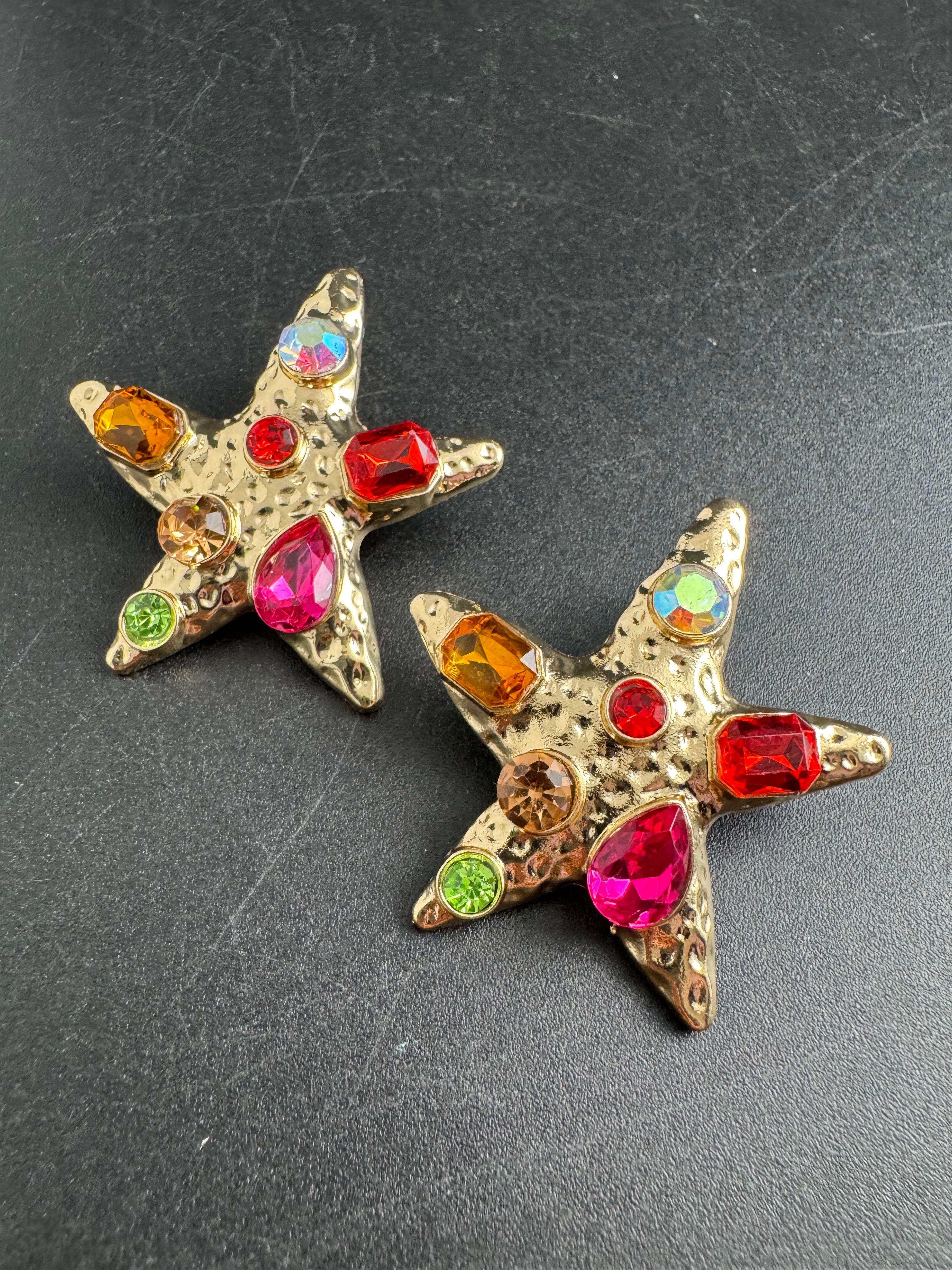 Oversized gold starfish earrings set with rainbow crystals, nautical jewellery