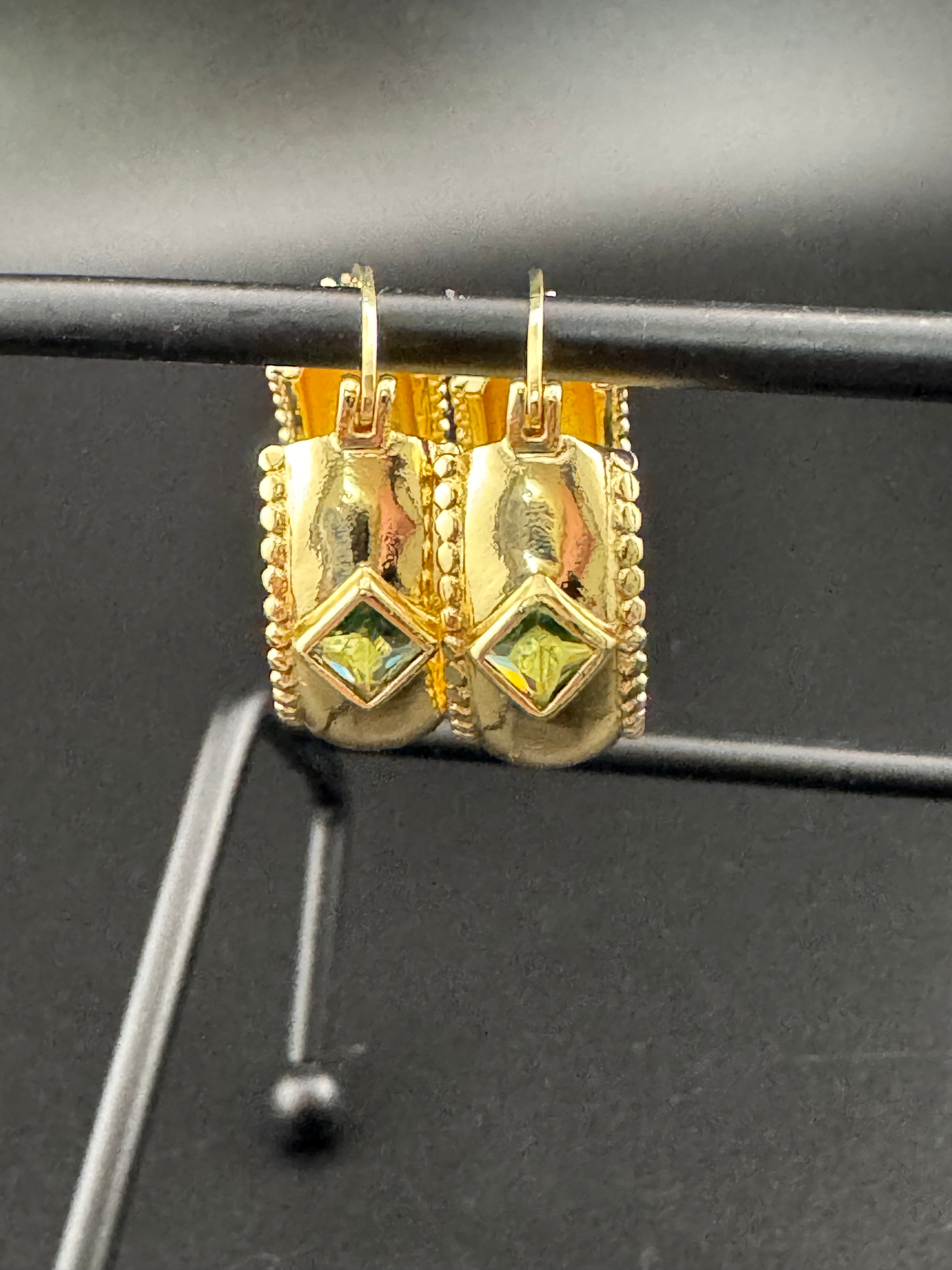Wide crystal gold hoop earrings with pink emerald and tourmaline crystals
