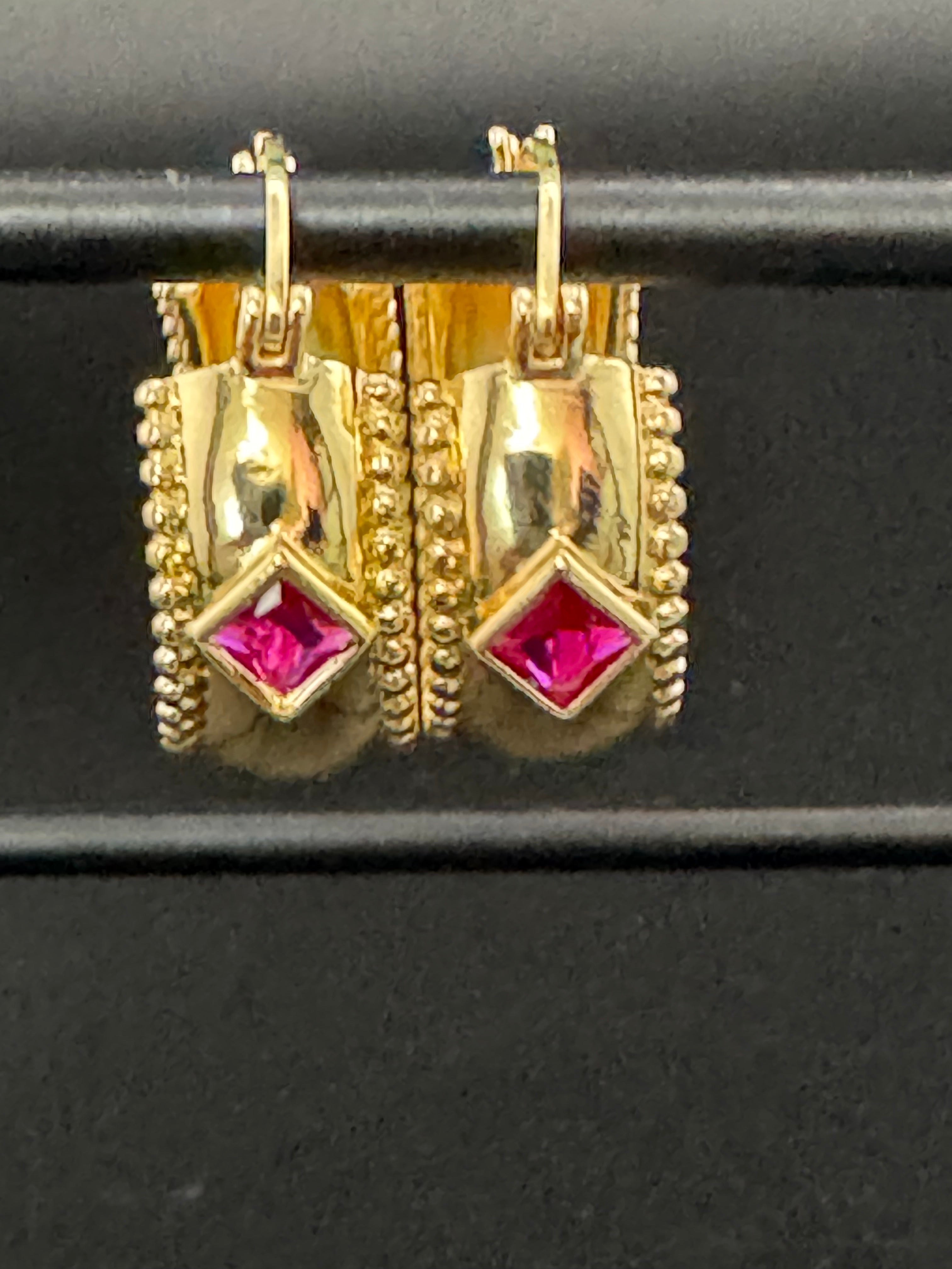 Wide crystal gold hoop earrings with pink emerald and tourmaline crystals