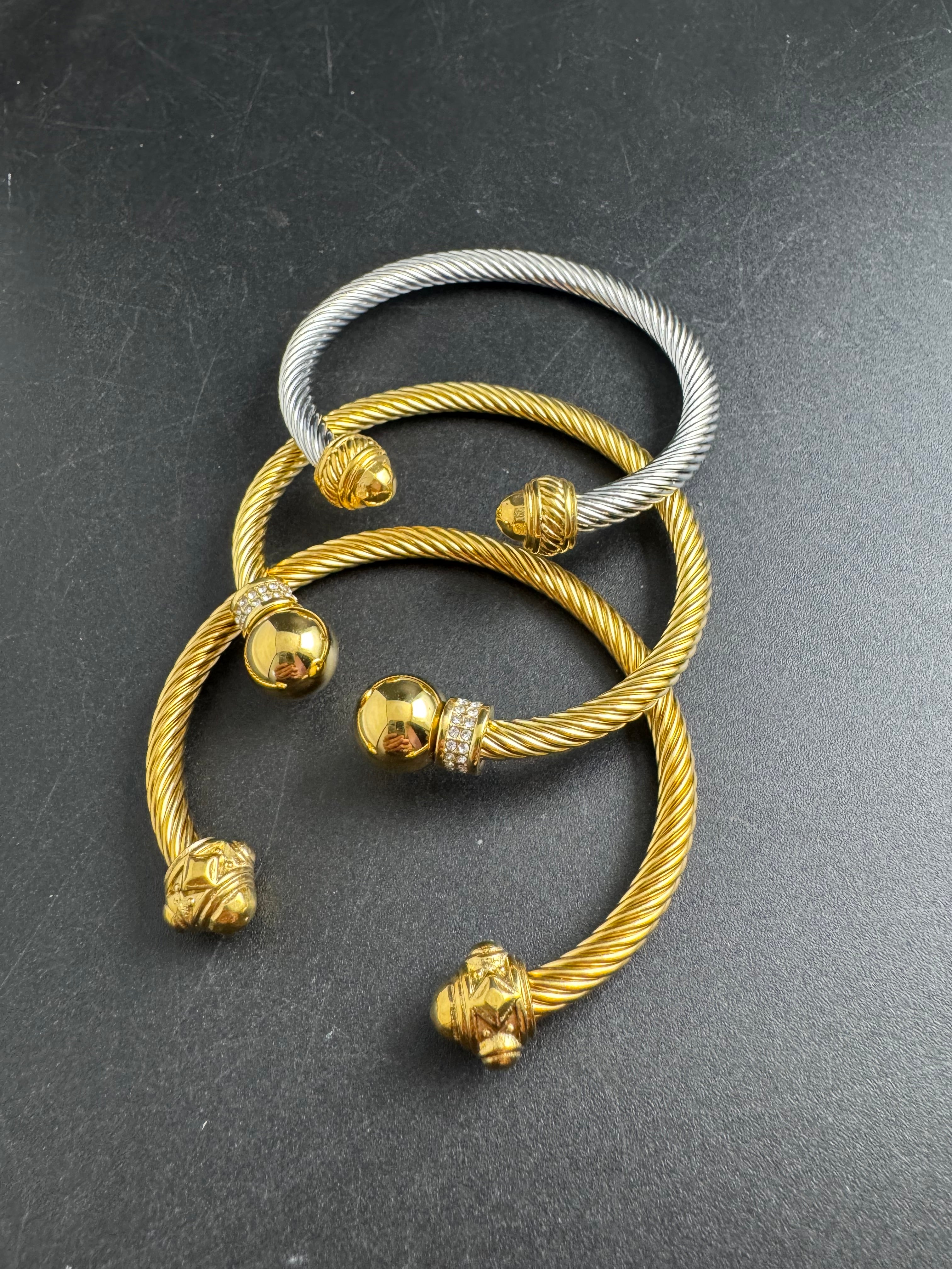 Etruscan style open twisted rhinestone torque cuff bangle gold tone