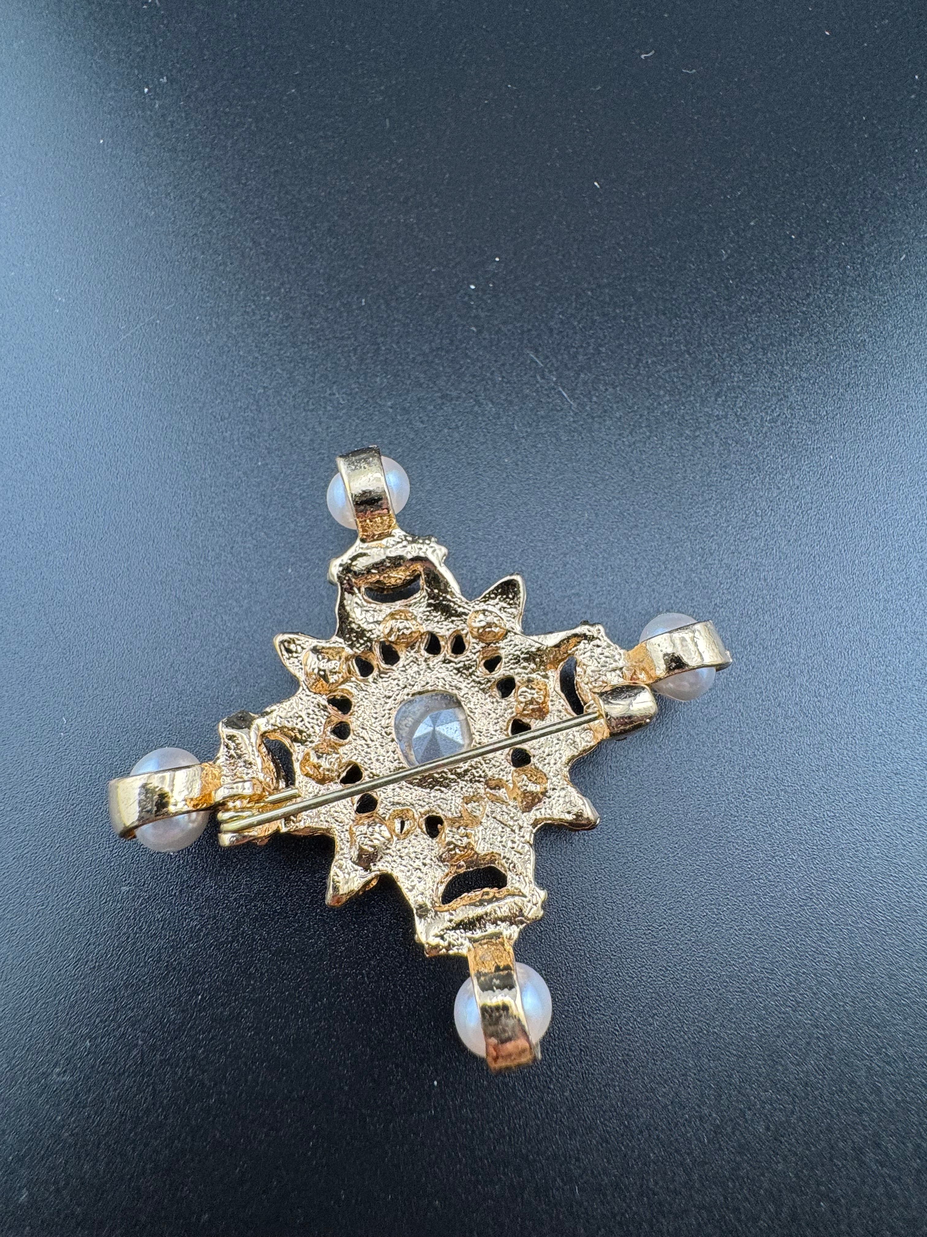 Statement Medieval style gold pink and green rhinestone cross brooch