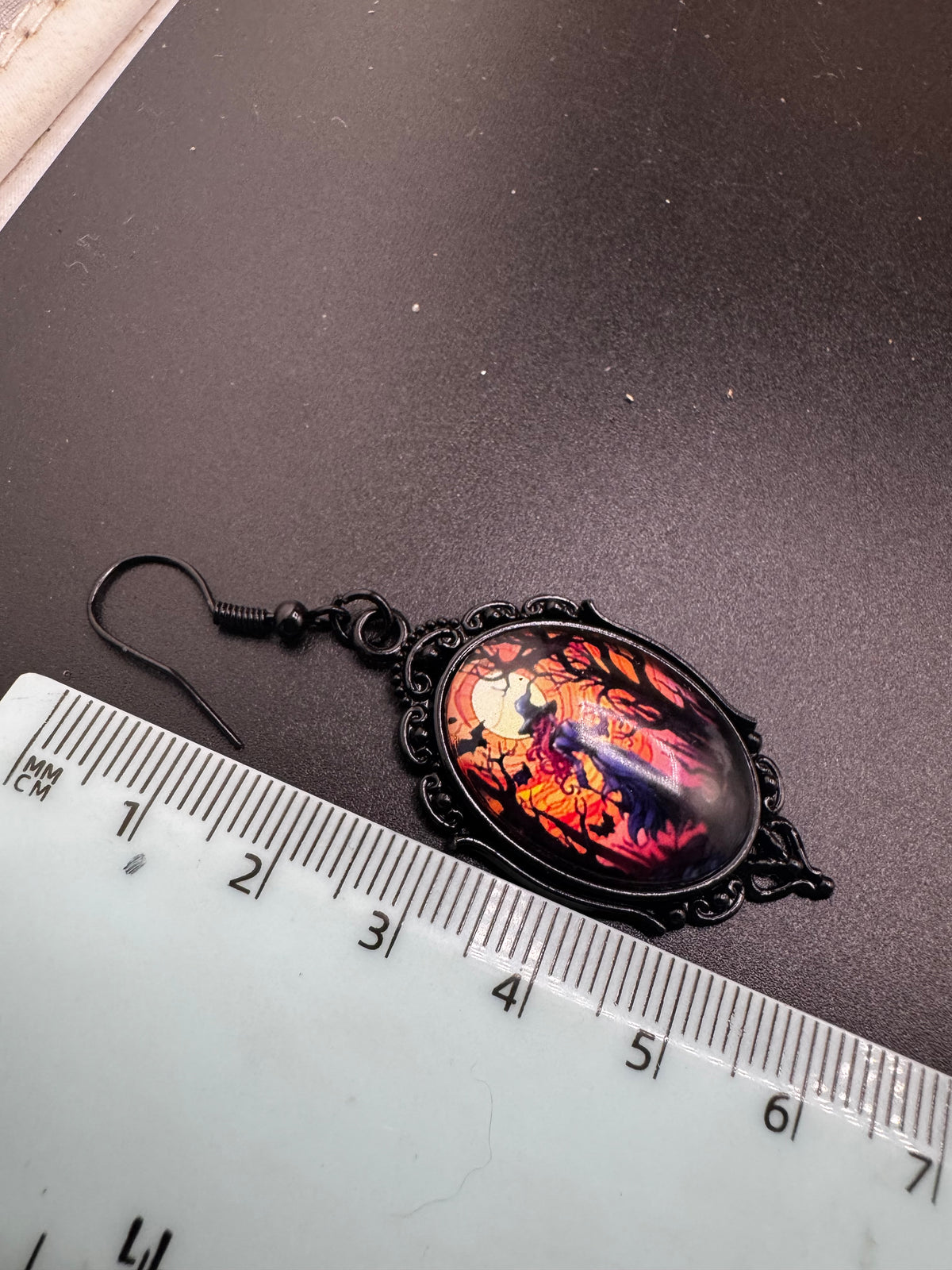 Spooky Halloween witch earrings for pierced ears black and orange
