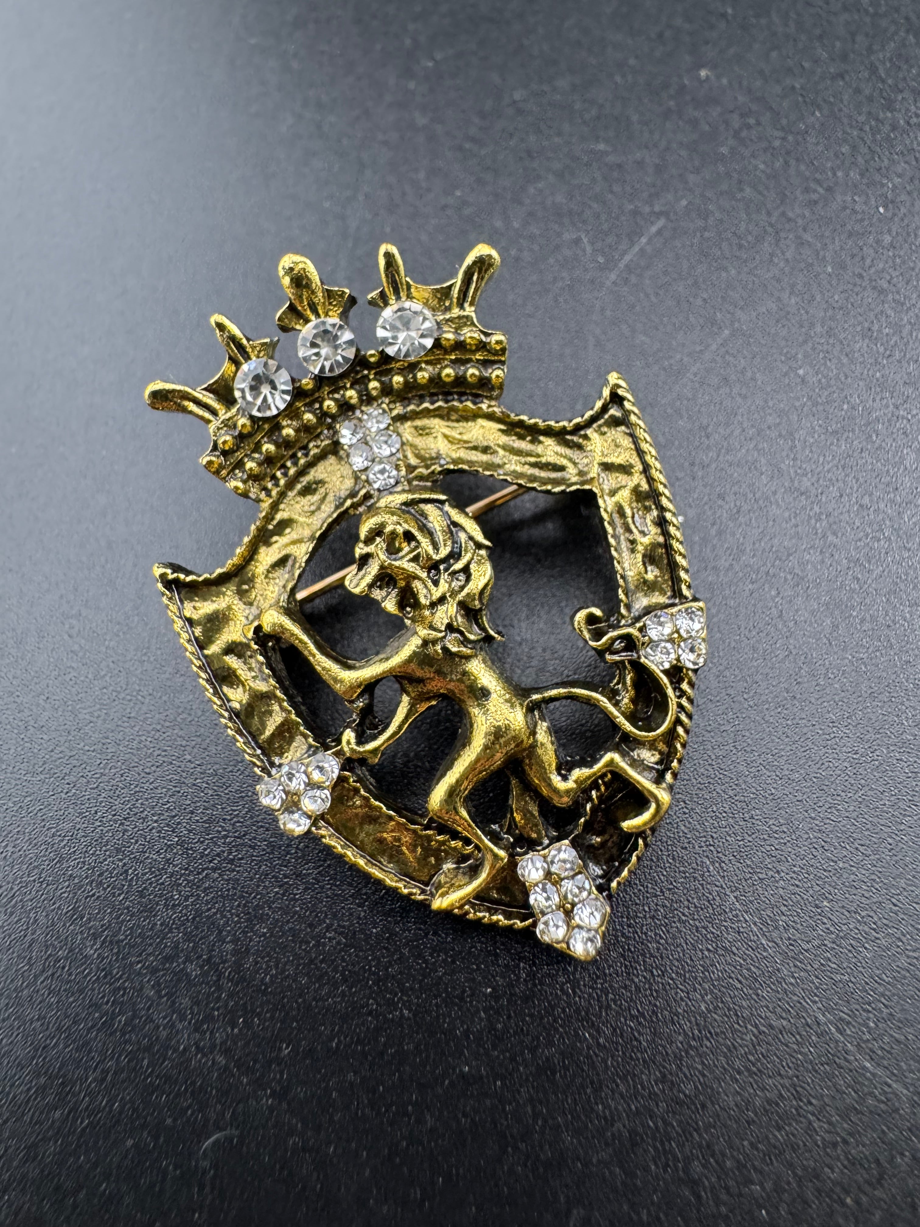 Crystal rampant lion shield brooch, antique gold tone